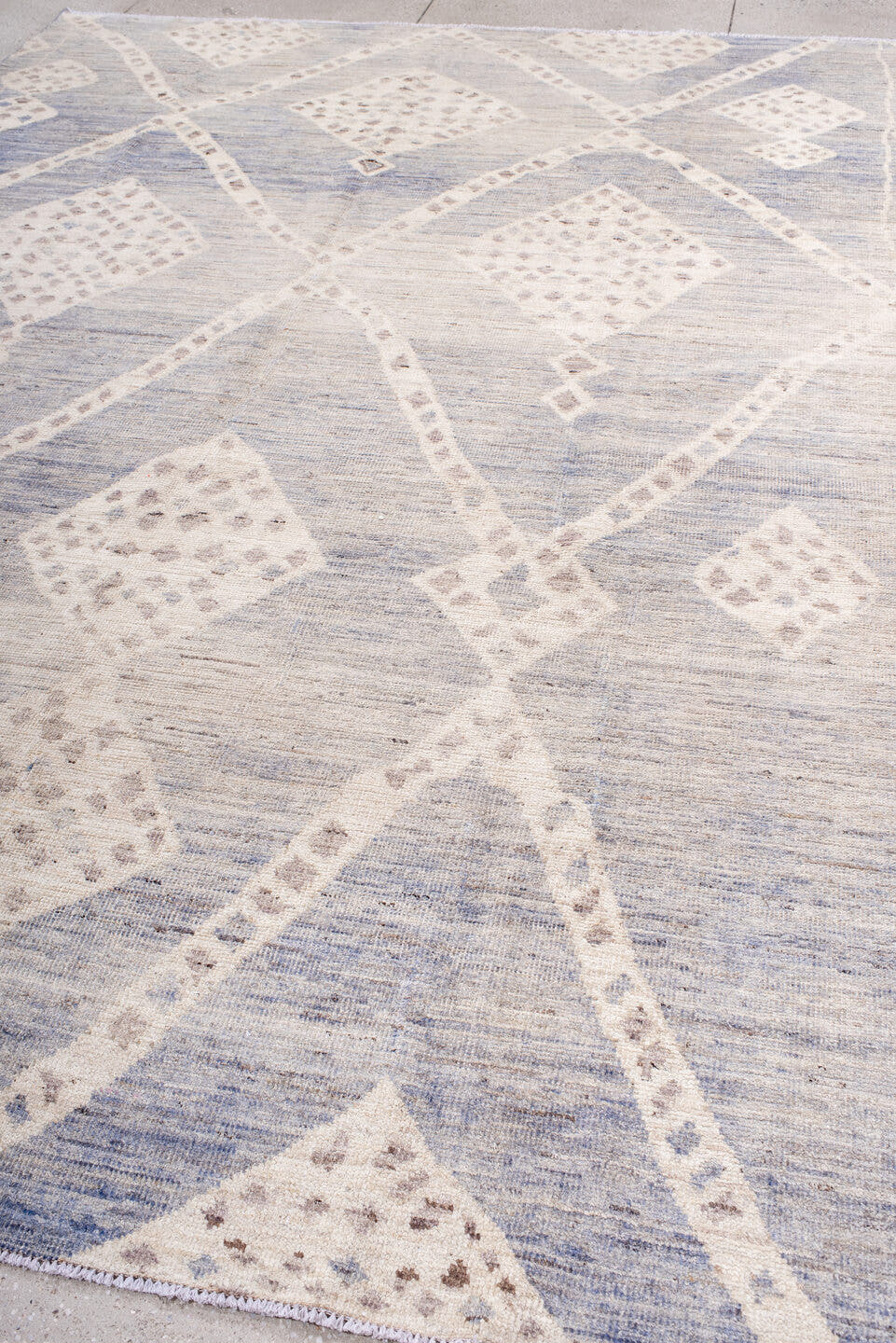 8' x 11' one-of-a-kind handmade vintage Tulu large size rug. Color palette: ivory, pale blue, taupe, cream, light blue