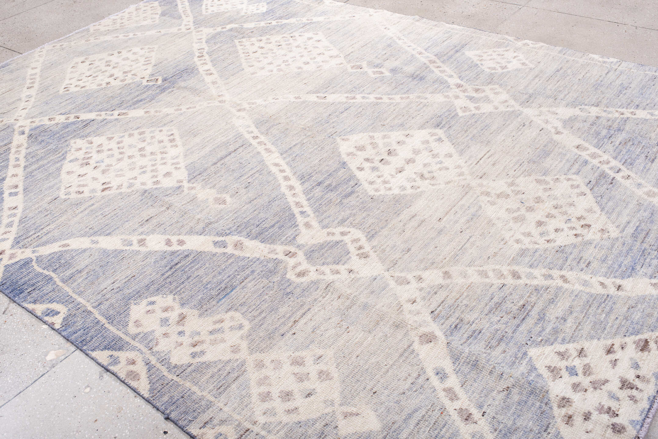 8' x 11' one-of-a-kind handmade vintage Tulu large size rug. Color palette: ivory, pale blue, taupe, cream, light blue