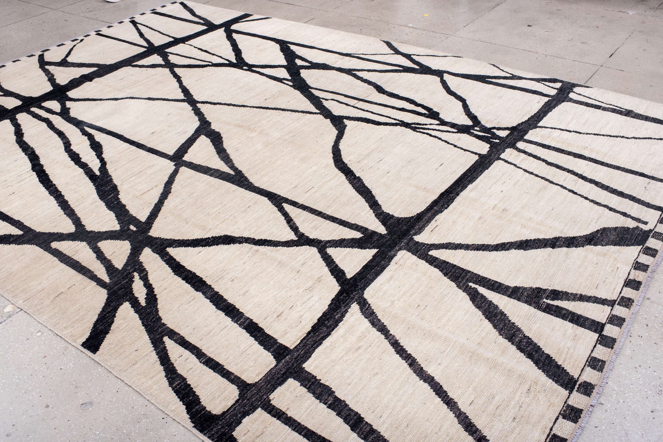9' x 12' one-of-a-kind handmade vintage Tulu large size rug. Color palette: ivory, charcoal, black, gray