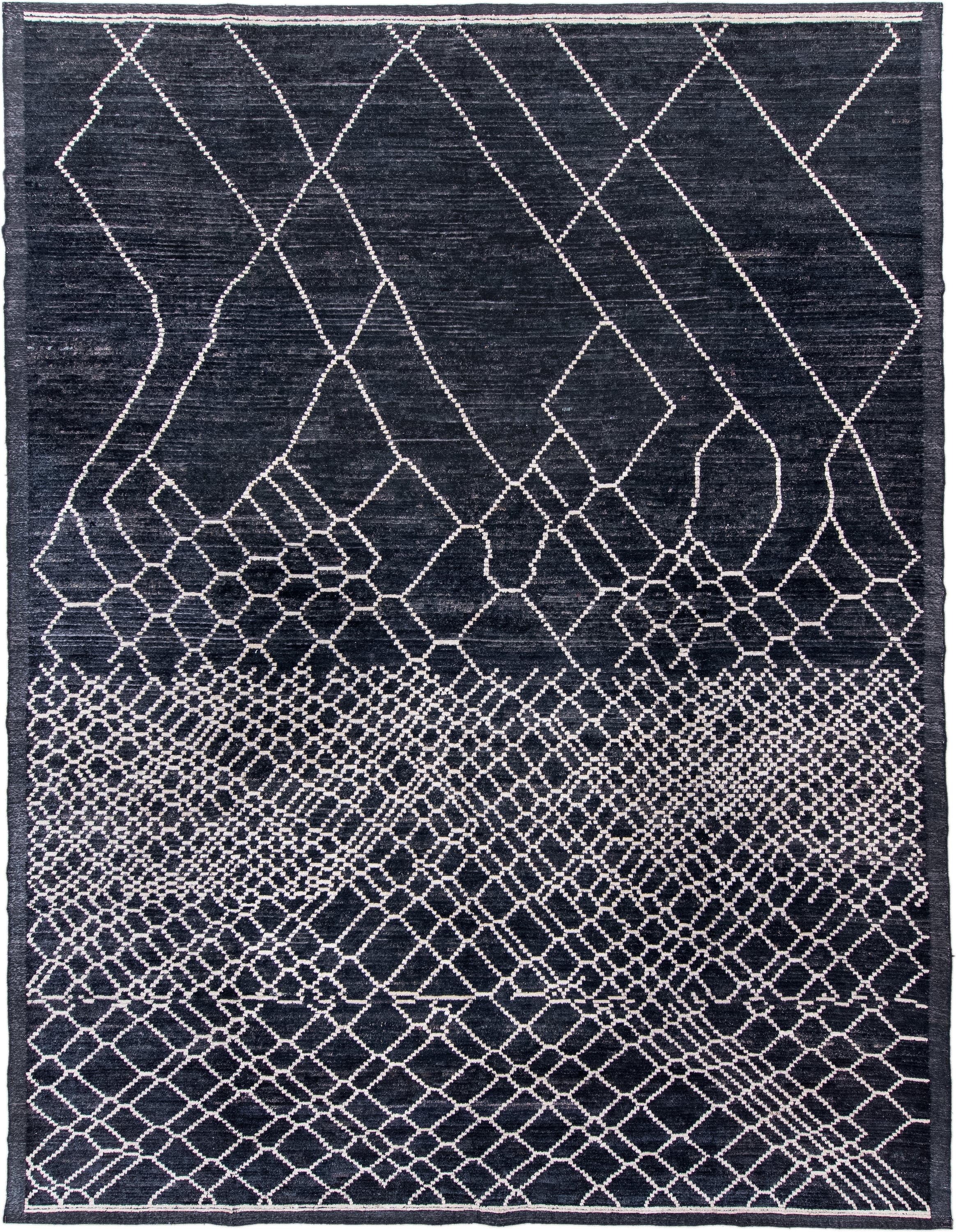 12' x 15' one-of-a-kind handmade vintage Tulu oversize rug. Color palette: charcoal, ivory, slate, gray, black
