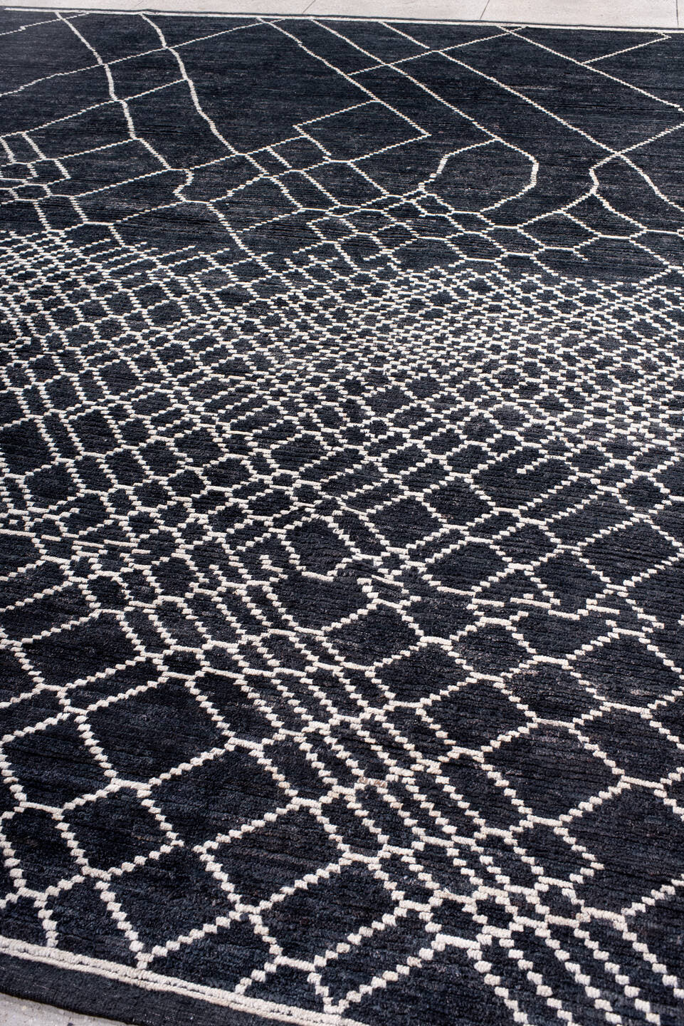 12' x 15' one-of-a-kind handmade vintage Tulu oversize rug. Color palette: charcoal, ivory, slate, gray, black