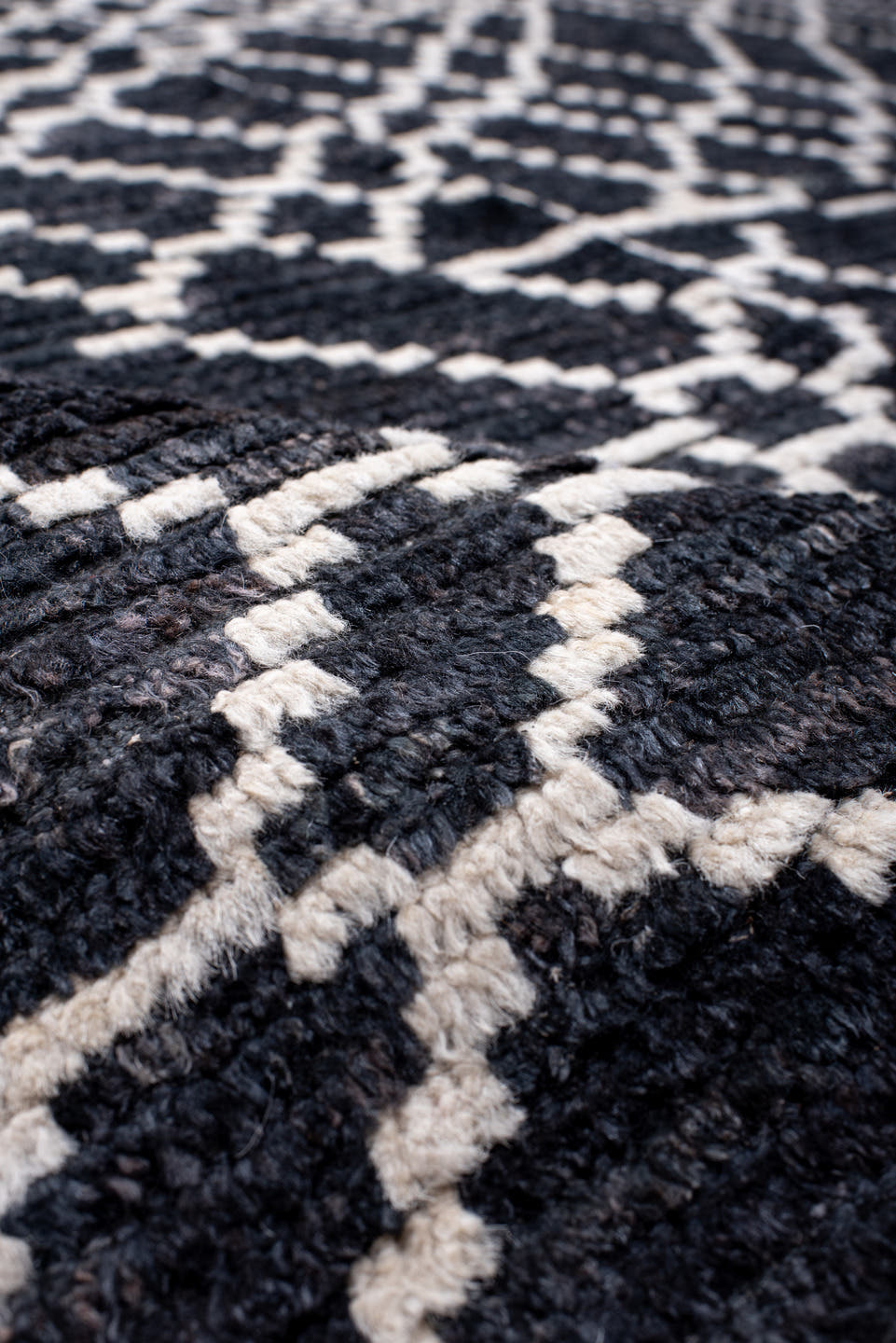 12' x 15' one-of-a-kind handmade vintage Tulu oversize rug. Color palette: charcoal, ivory, slate, gray, black