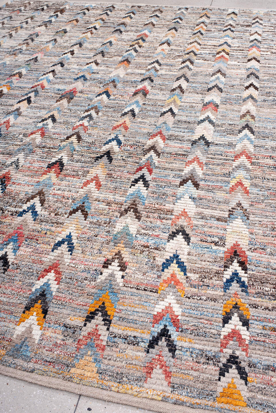 9' x 12' one-of-a-kind handmade vintage Tulu large size rug. Color palette: ivory, sky_blue, charcoal, taupe, rust, gold