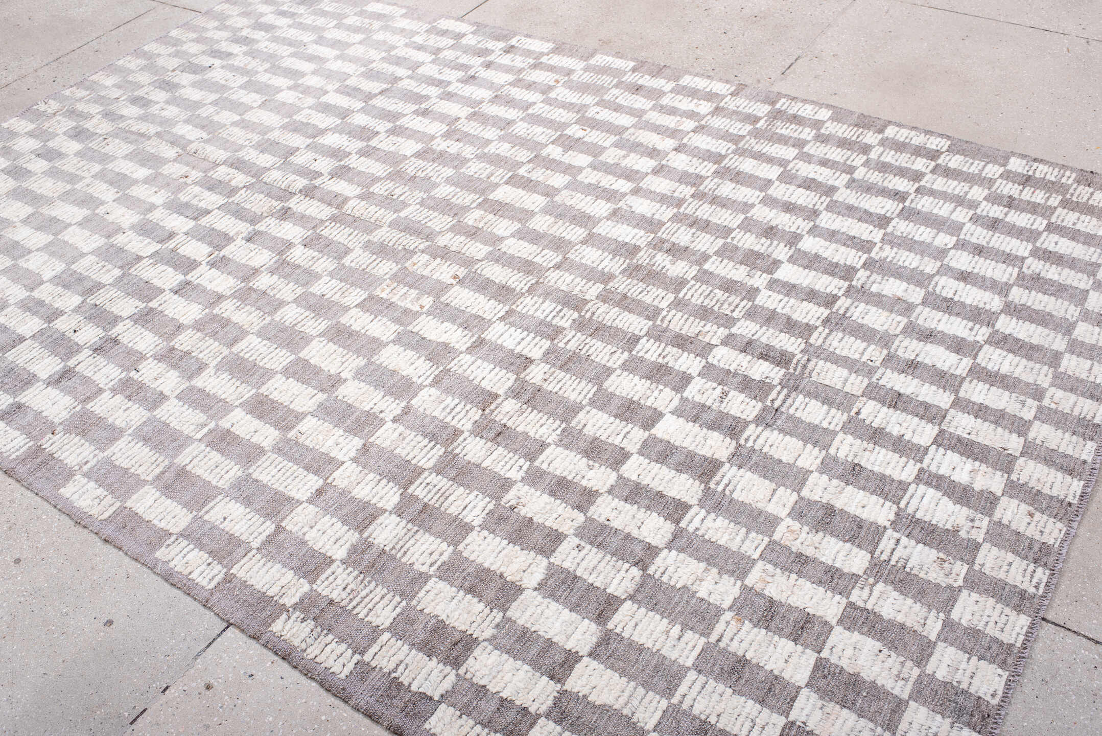 6' x 9' one-of-a-kind handmade vintage Tulu medium size rug. Color palette: ivory, taupe, light gray, beige, gray