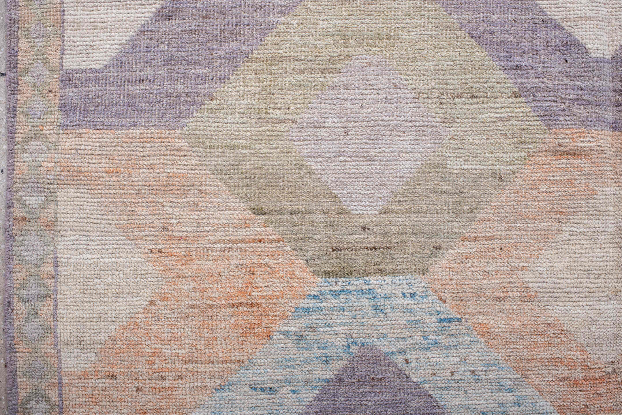 5' x 7' one-of-a-kind handmade vintage Tulu rug. Color palette: ivory, lilac, blush, pale blue, taupe, sage, purple, pink