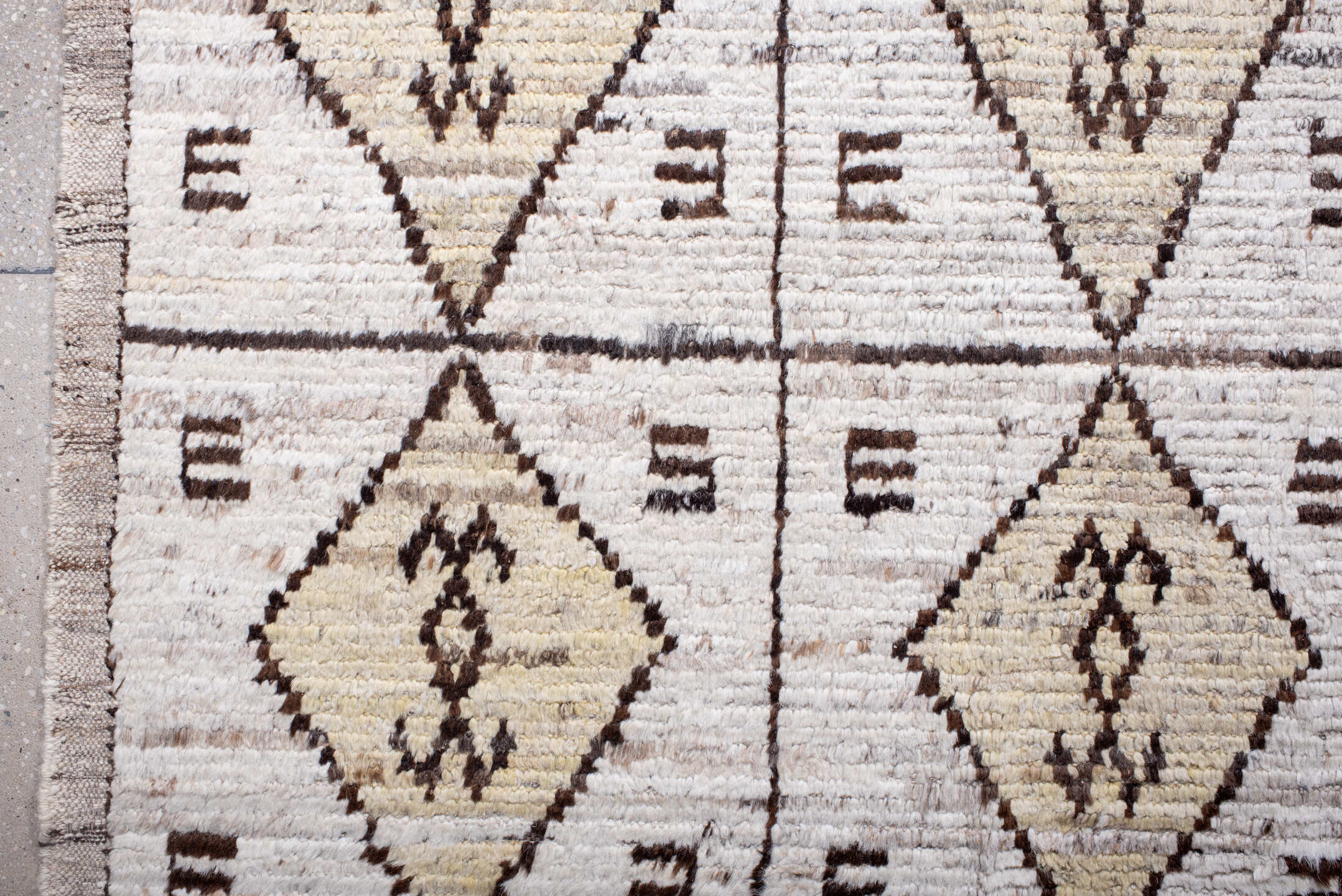 9' x 11' one-of-a-kind handmade vintage Tulu large size rug. Color palette: cream, ivory, taupe, brown, camel, beige, gray