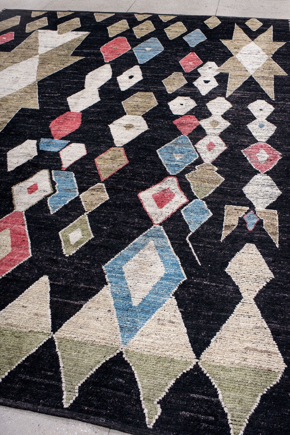 10' x 13' one-of-a-kind handmade vintage Tulu large size rug. Color palette: charcoal, ivory, camel, sky_blue, crimson, sage