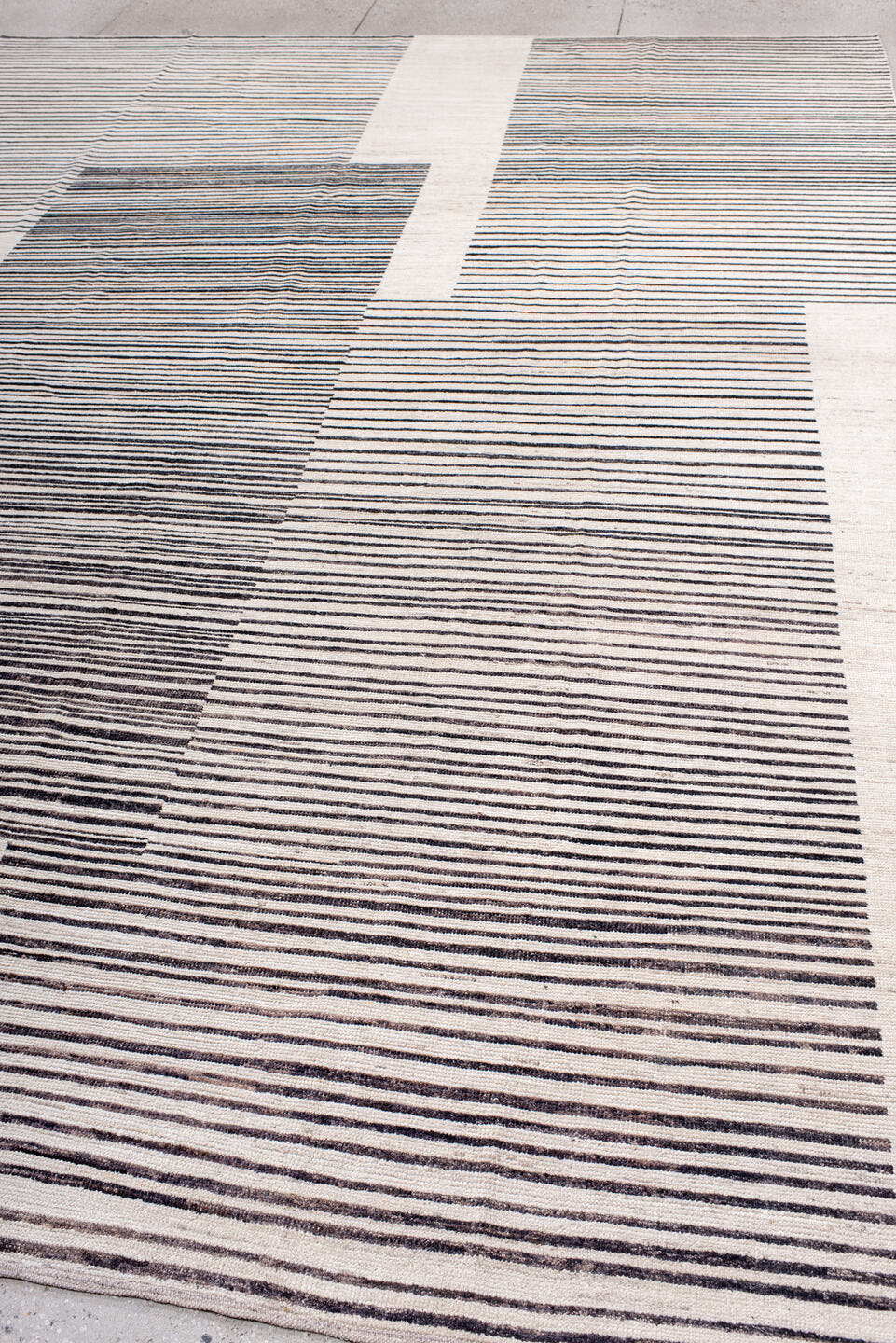 10' x 13' one-of-a-kind handmade vintage Tulu large size rug. Color palette: ivory, charcoal, gray, black