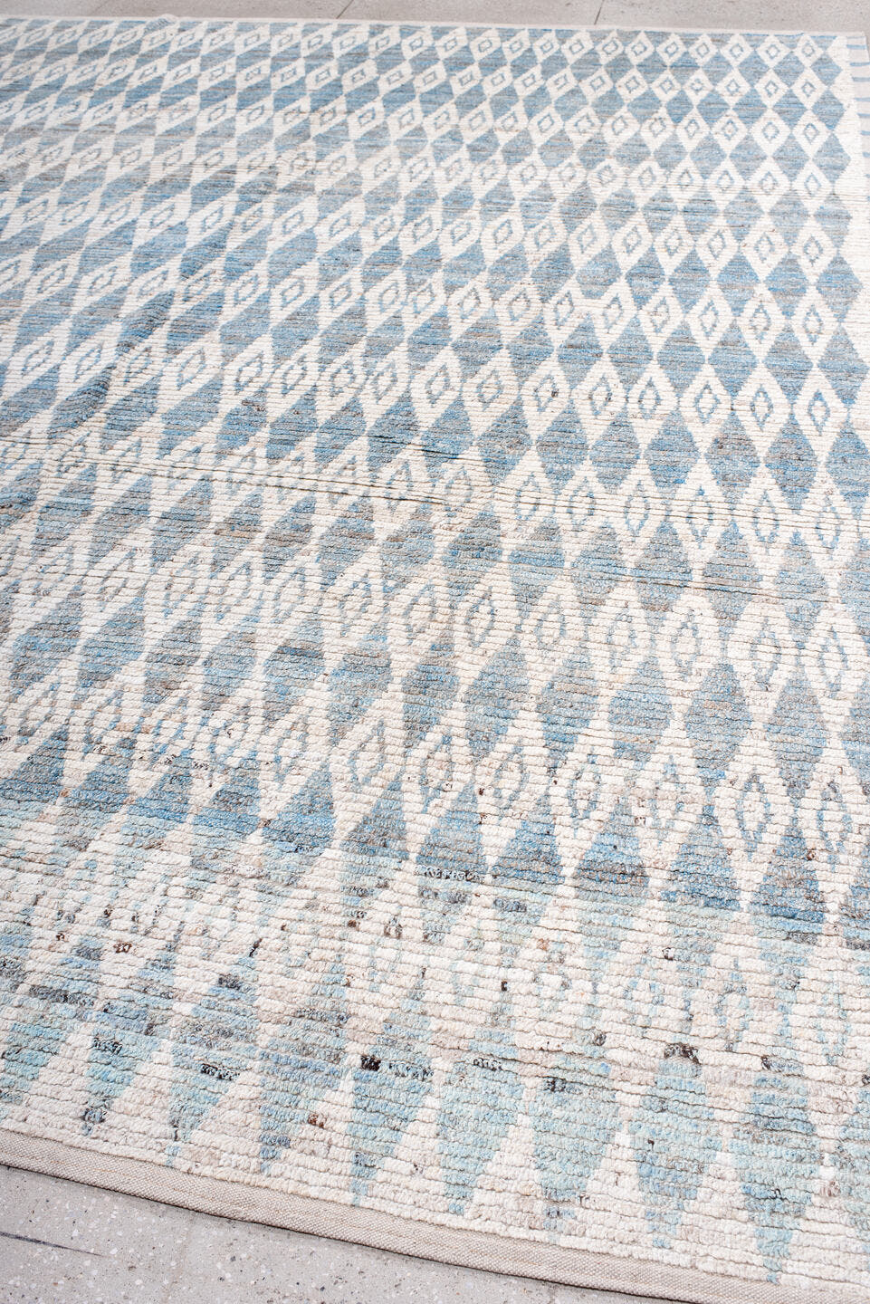 10' x 13' one-of-a-kind handmade vintage Tulu large size rug. Color palette: ivory, sky blue, pale blue, taupe, light blue