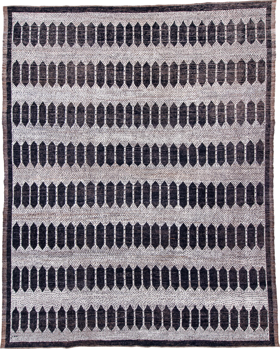 12' x 15' one-of-a-kind handmade vintage Tulu oversize rug. Color palette: ivory, charcoal, taupe, brown, gray, black, beige