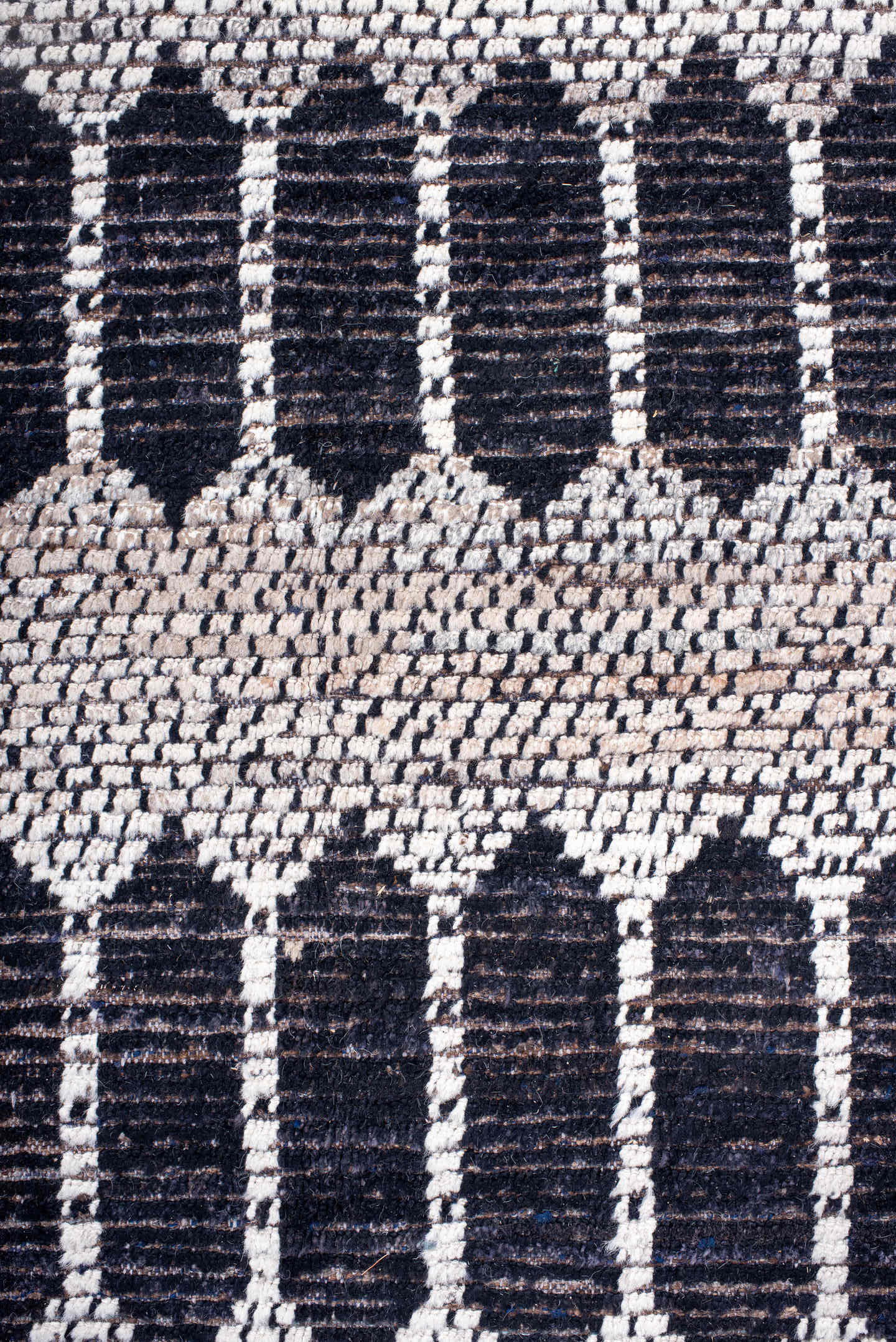 12' x 15' one-of-a-kind handmade vintage Tulu oversize rug. Color palette: ivory, charcoal, taupe, brown, gray, black, beige