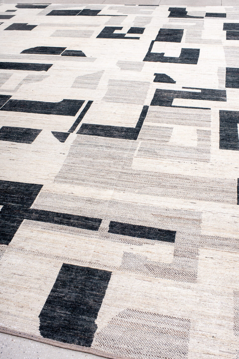 13' x 17' one-of-a-kind handmade vintage Tulu oversize rug. Color palette: ivory, charcoal, light gray, taupe, gray, black