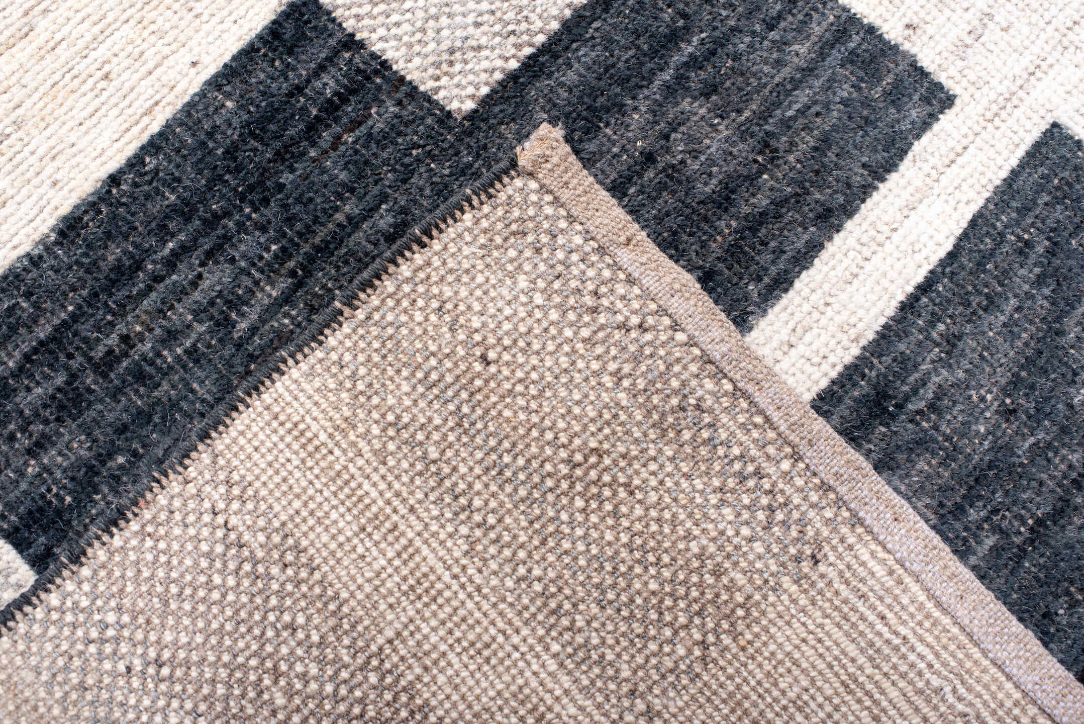 13' x 17' one-of-a-kind handmade vintage Tulu oversize rug. Color palette: ivory, charcoal, light gray, taupe, gray, black