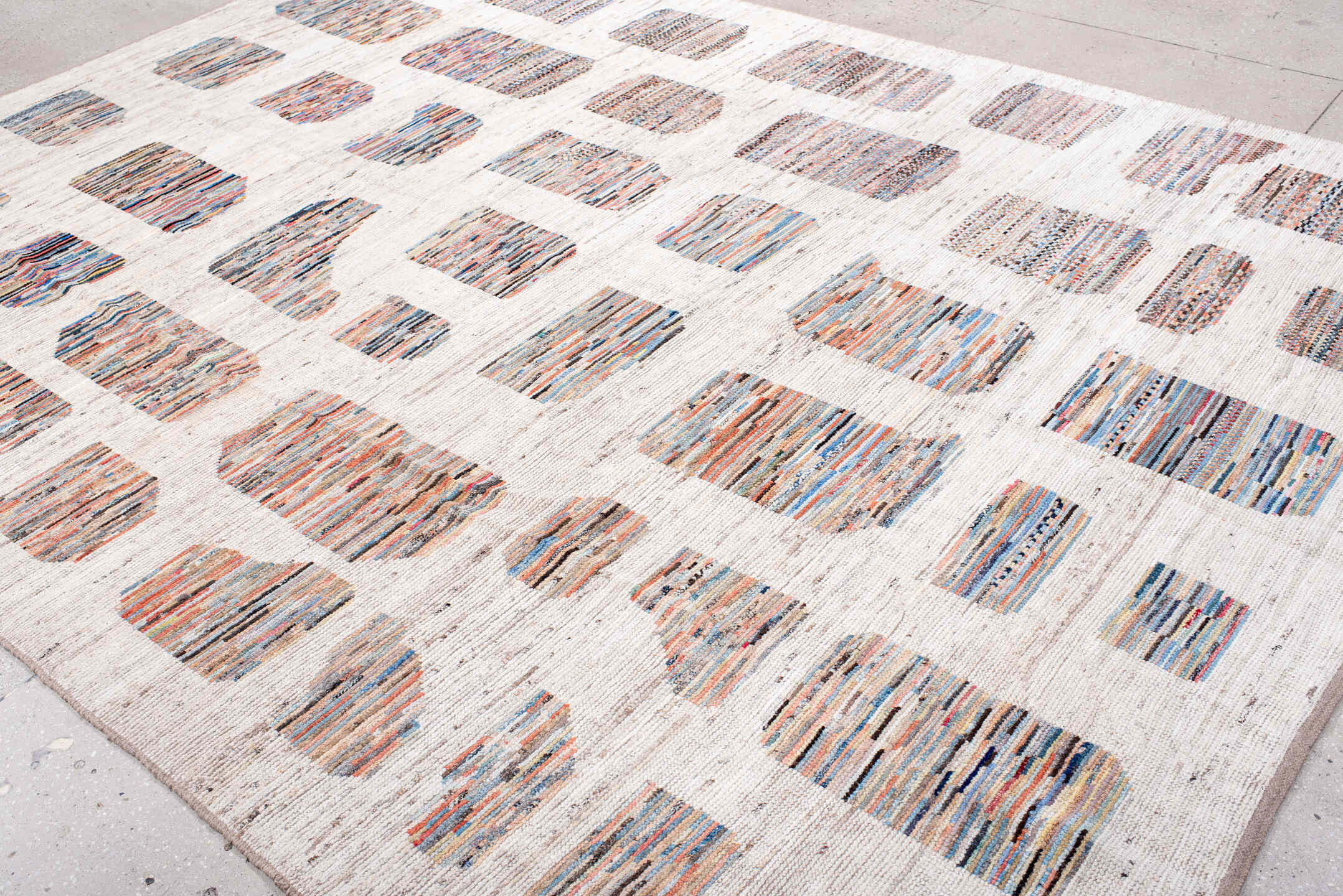 8' x 11' one-of-a-kind handmade vintage Tulu large size rug. Color palette: ivory, sky blue, coral, slate, charcoal, taupe