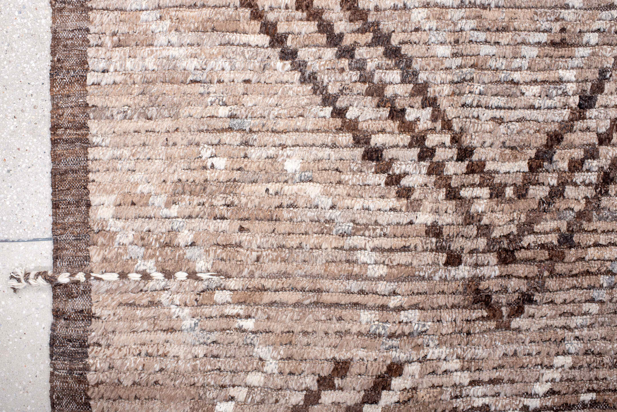 9' x 12' one-of-a-kind handmade vintage Tulu large size rug. Color palette: taupe, ivory, brown, camel, beige, gray
