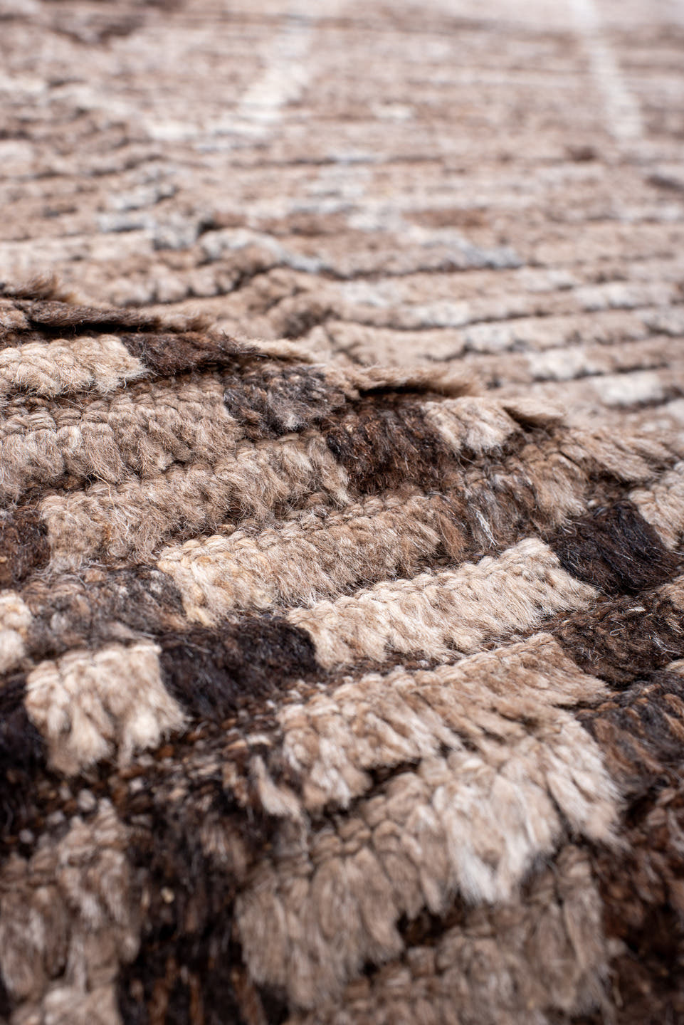 9' x 12' one-of-a-kind handmade vintage Tulu large size rug. Color palette: taupe, ivory, brown, camel, beige, gray