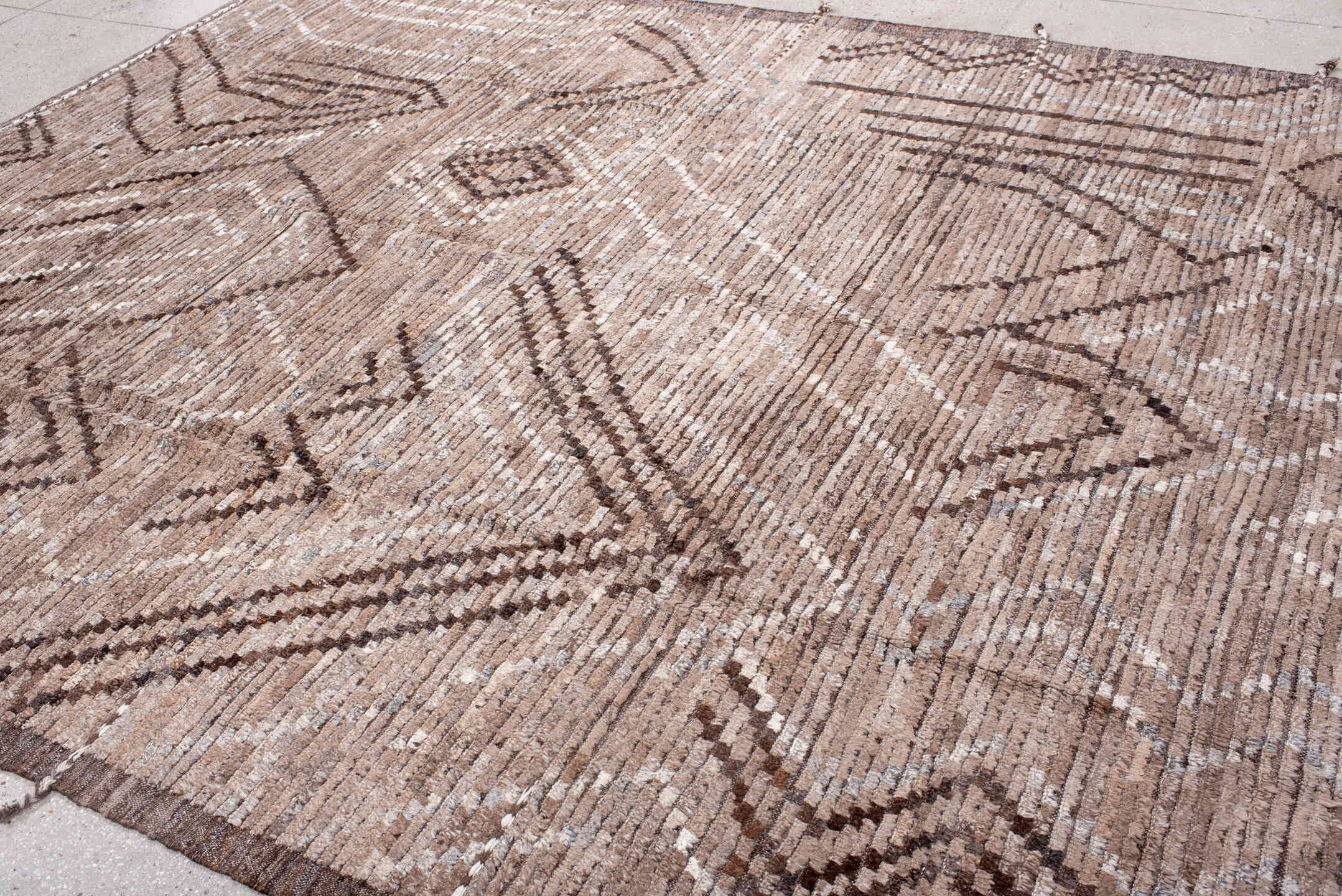 9' x 12' one-of-a-kind handmade vintage Tulu large size rug. Color palette: taupe, ivory, brown, camel, beige, gray