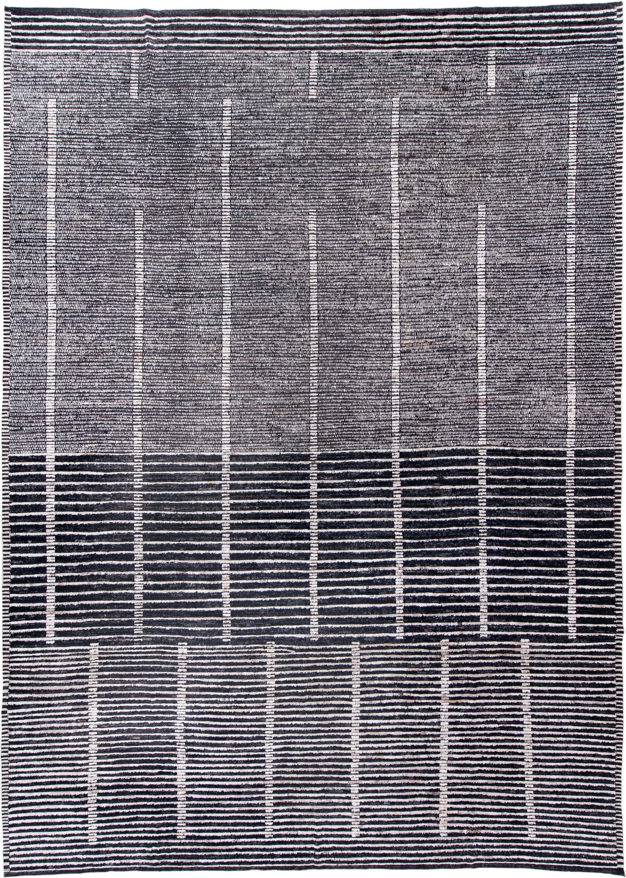 13' x 19' one-of-a-kind handmade vintage Tulu oversize rug. Color palette: charcoal, ivory, slate, black, gray