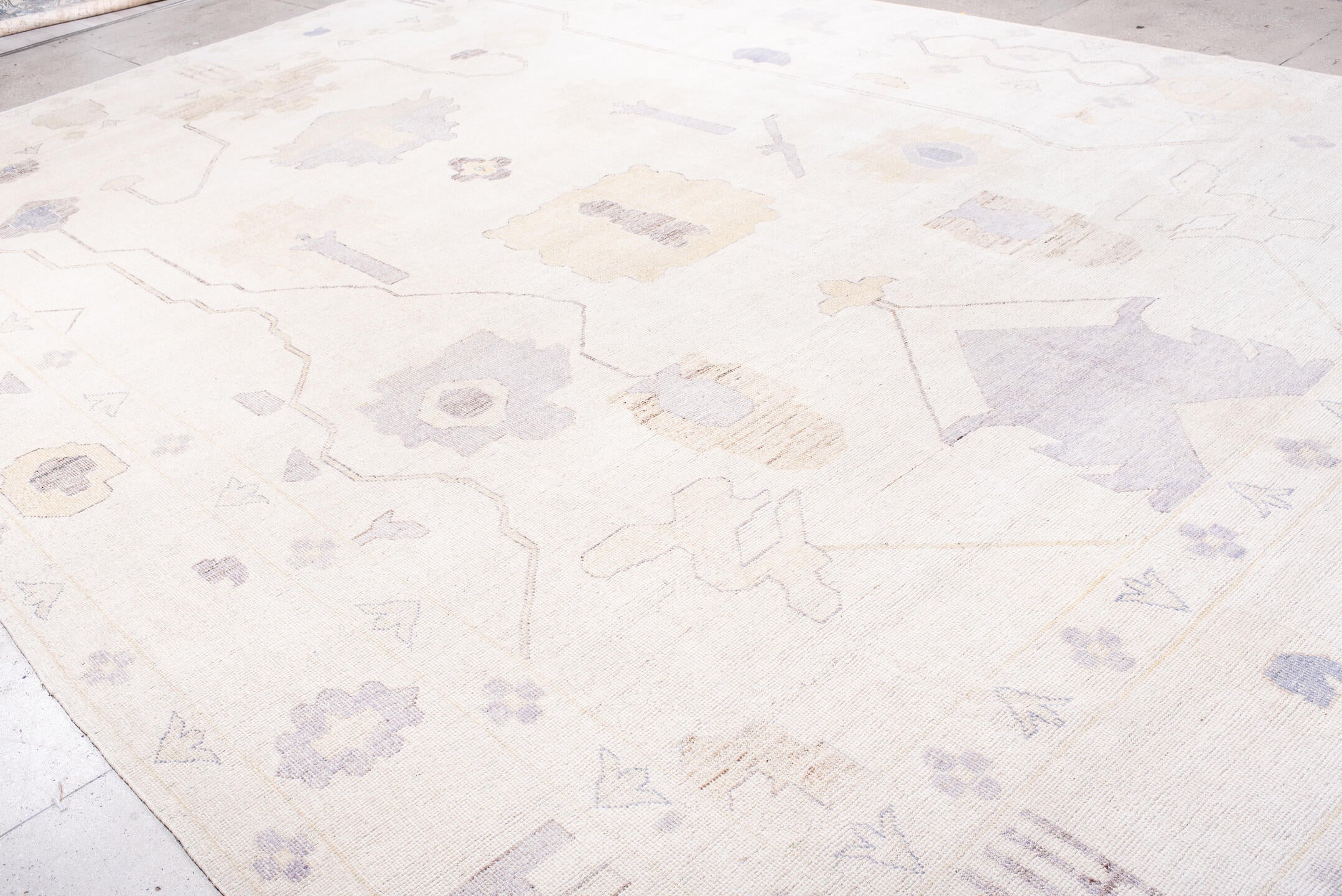 13' x 19' one-of-a-kind handmade vintage Oushak oversize rug. Color palette: ivory, lavender, cream, pale gold, beige, taupe