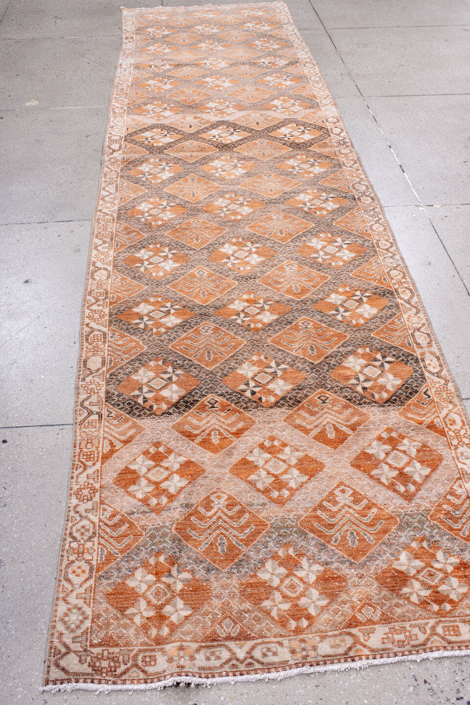 3' x 13' one-of-a-kind handmade vintage Sparta runner rug. Color palette: terra cotta, ivory, taupe, brown, rust, camel