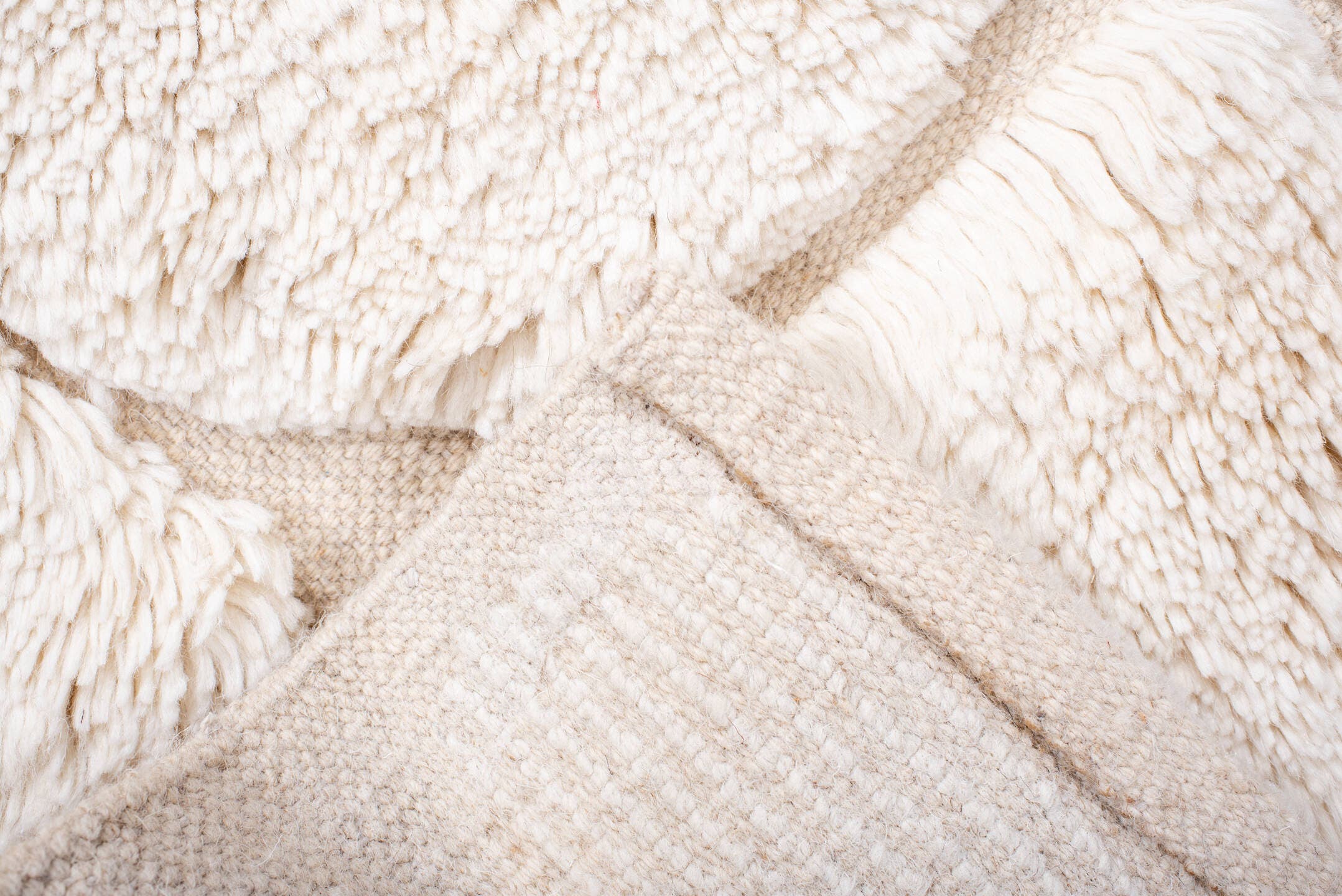 5' x 7' one-of-a-kind handmade vintage Moroccan medium size rug. Color palette: ivory, cream, beige
