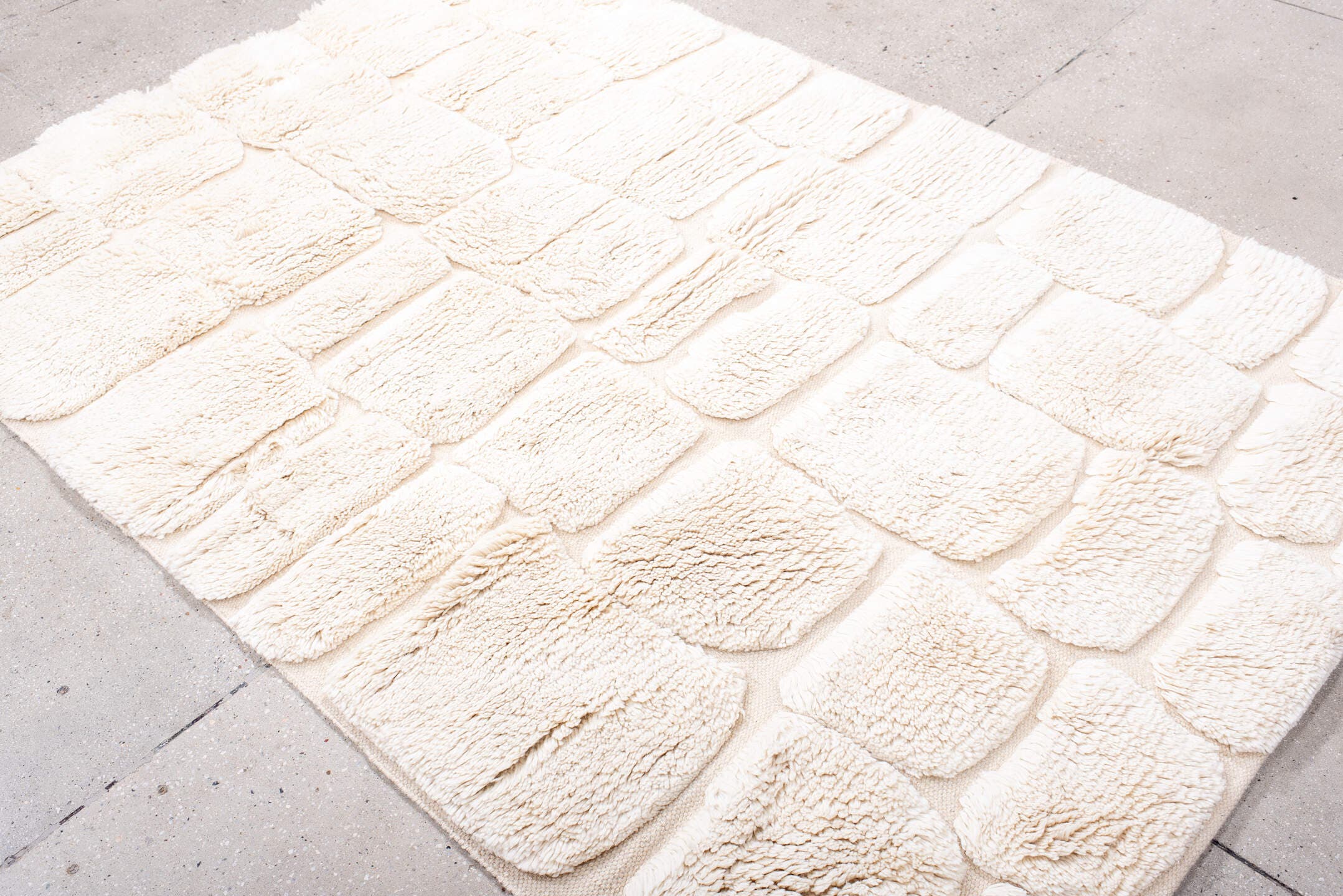 5' x 7' one-of-a-kind handmade vintage Moroccan medium size rug. Color palette: ivory, cream, beige