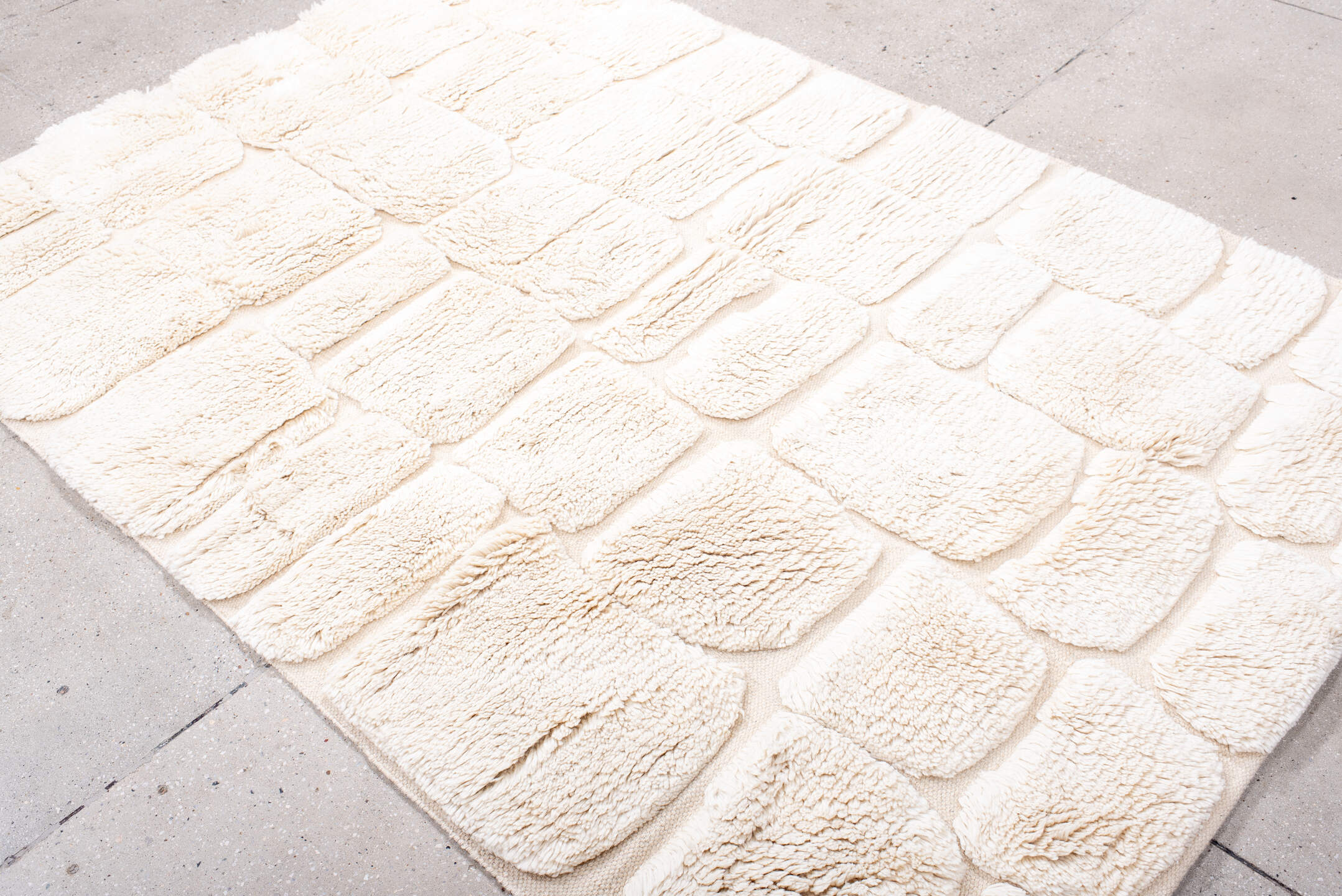 5' x 7' one-of-a-kind handmade vintage Moroccan medium size rug. Color palette: ivory, cream, beige