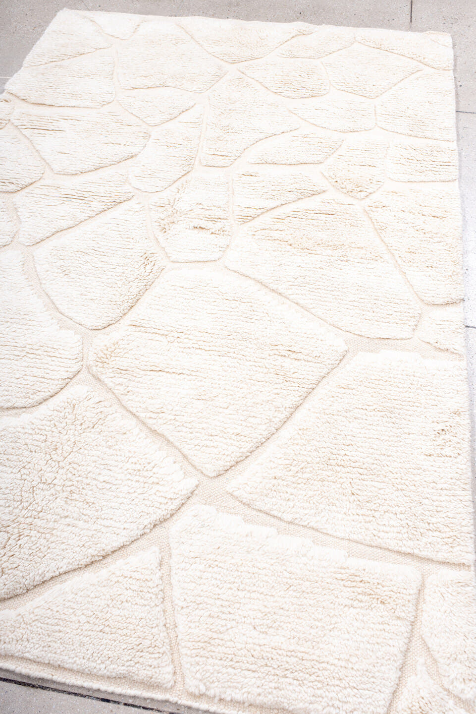 5' x 8' one-of-a-kind handmade vintage Moroccan medium size rug. Color palette: ivory, cream, beige