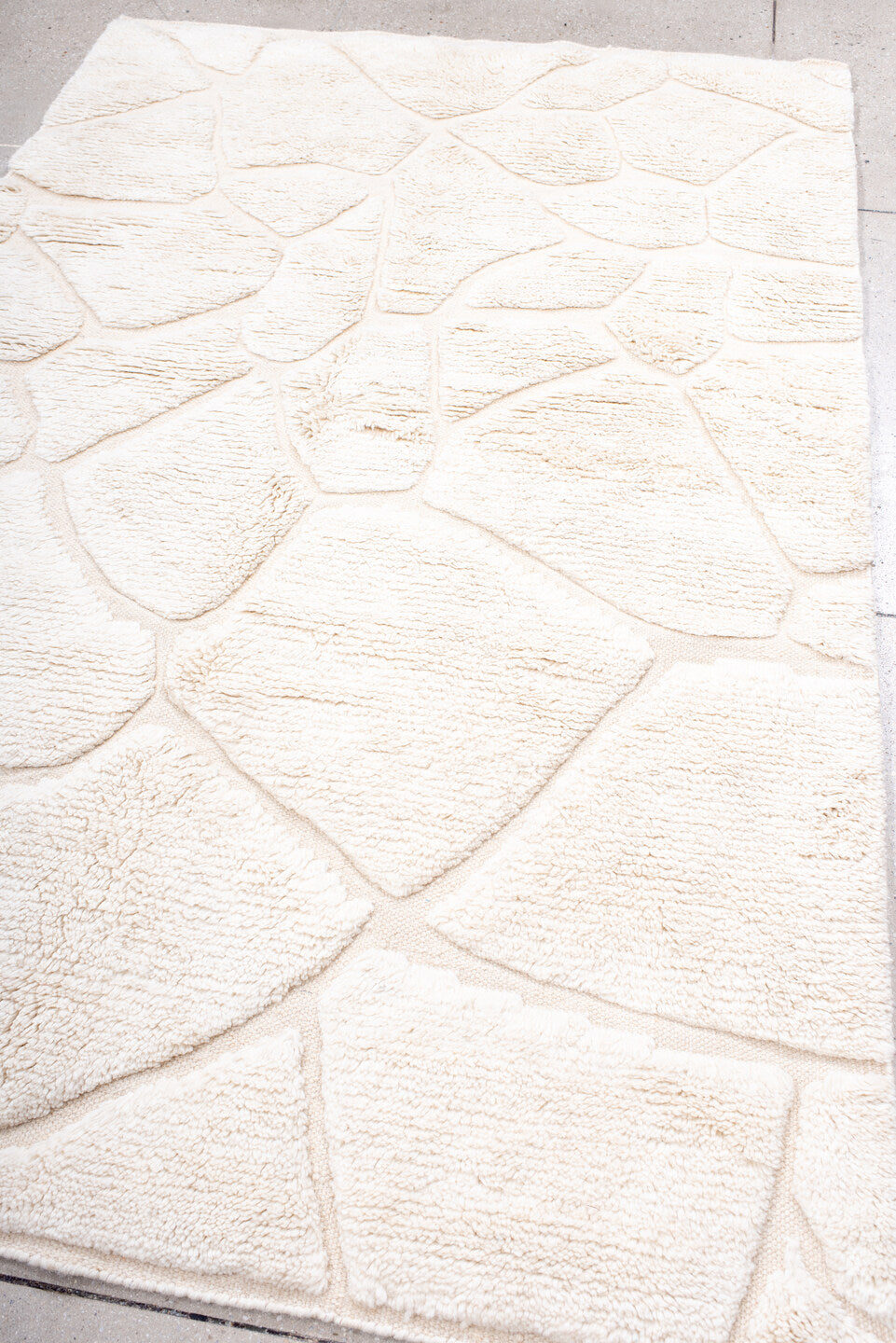 5' x 8' one-of-a-kind handmade vintage Moroccan medium size rug. Color palette: ivory, cream, beige