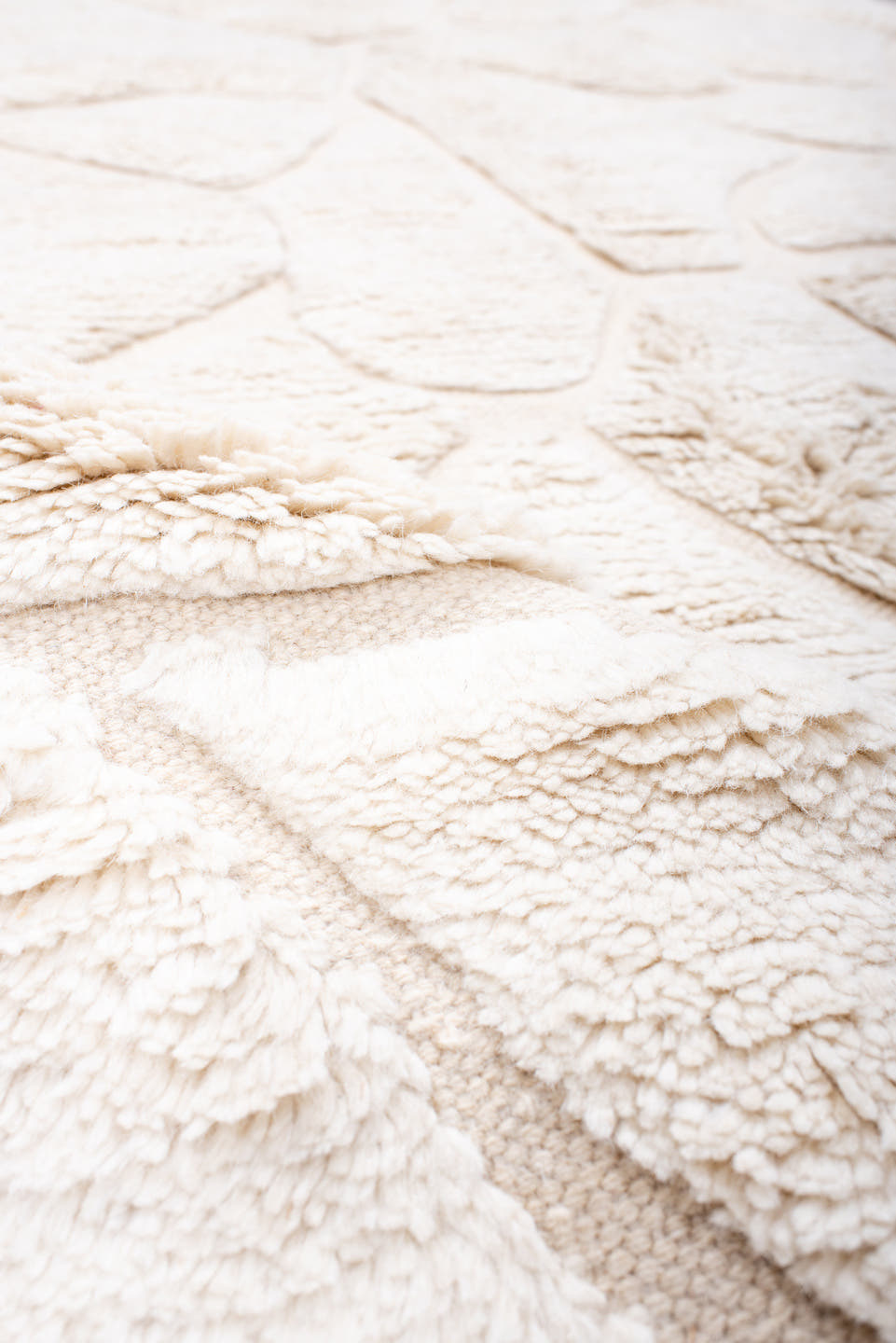 5' x 8' one-of-a-kind handmade vintage Moroccan medium size rug. Color palette: ivory, cream, beige