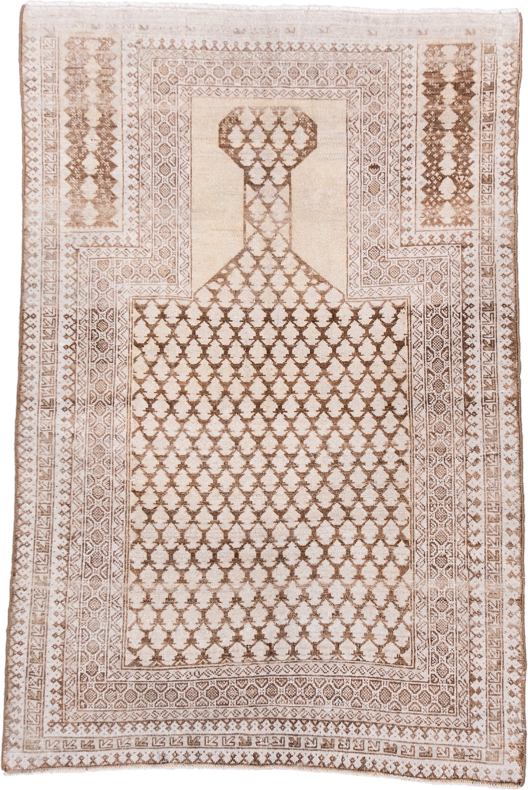 3' x 4' one-of-a-kind handmade antique Belouch small size rug. Color palette: ivory, camel, taupe, beige, sand, brown, gray