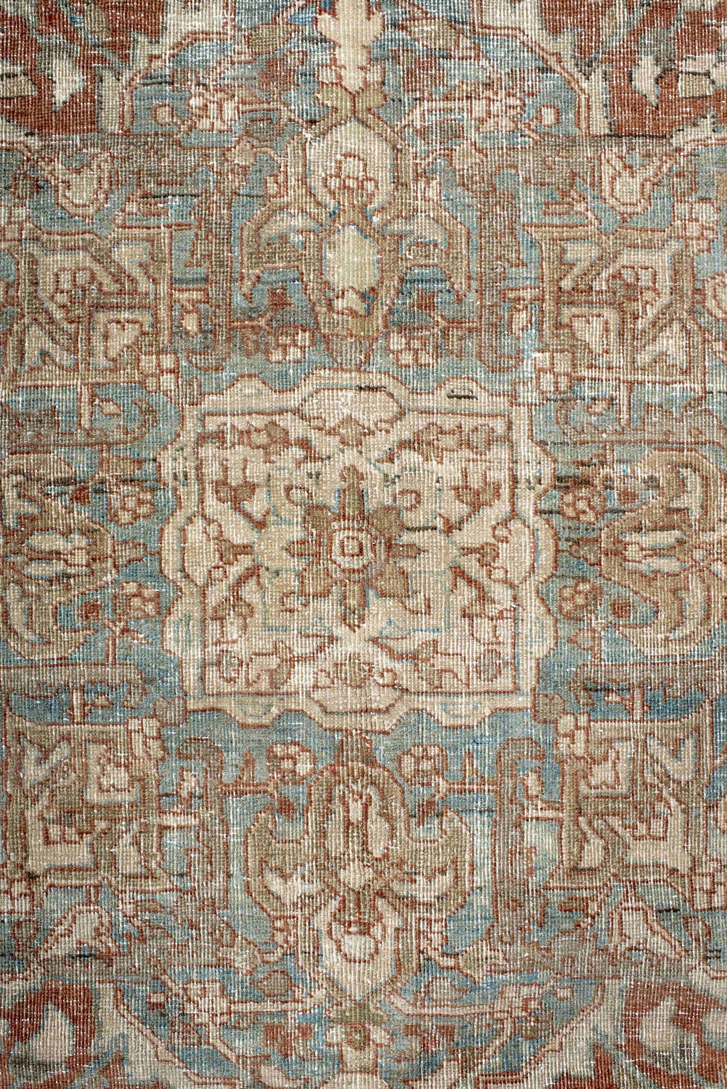 7' x 9' one-of-a-kind handmade antique Heriz rug. Color palette: ivory, sky blue, rust, taupe, camel, brown, light blue