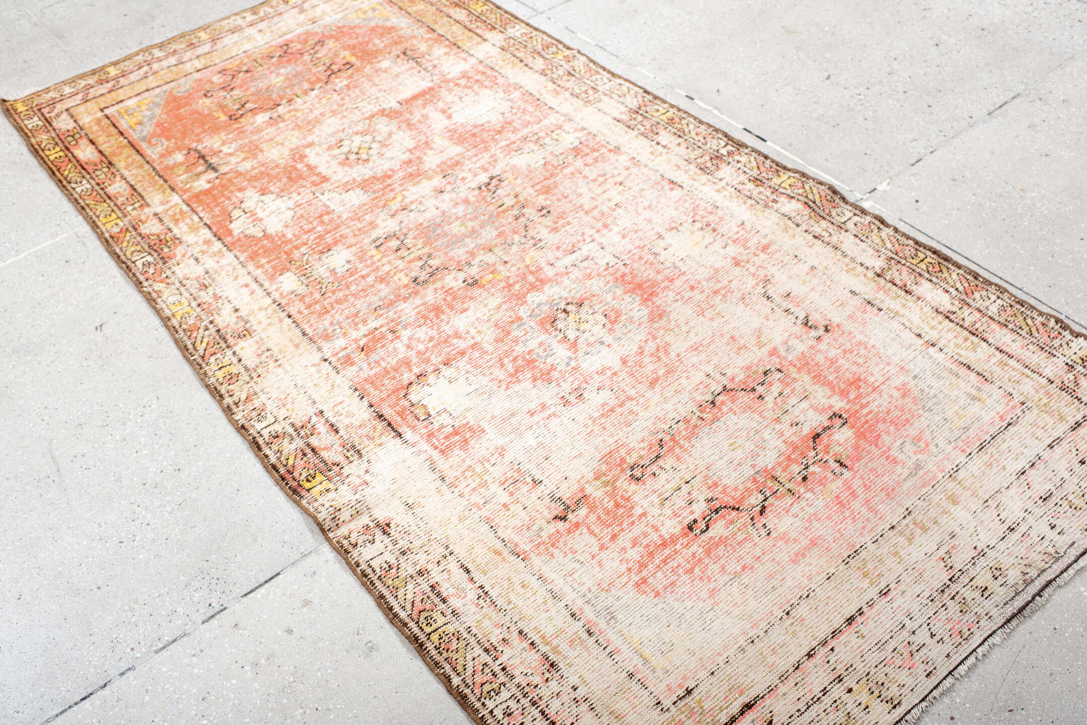 3' x 7' one-of-a-kind handmade antique Khotan rug. Color palette: ivory, coral, peach, taupe, brown, gold, charcoal