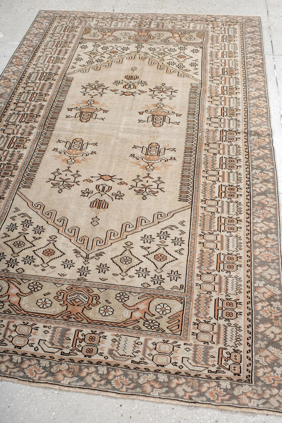 4' x 7' one-of-a-kind handmade antique Anatolian rug. Color palette: ivory, taupe, charcoal, blush, cream, pewter, beige