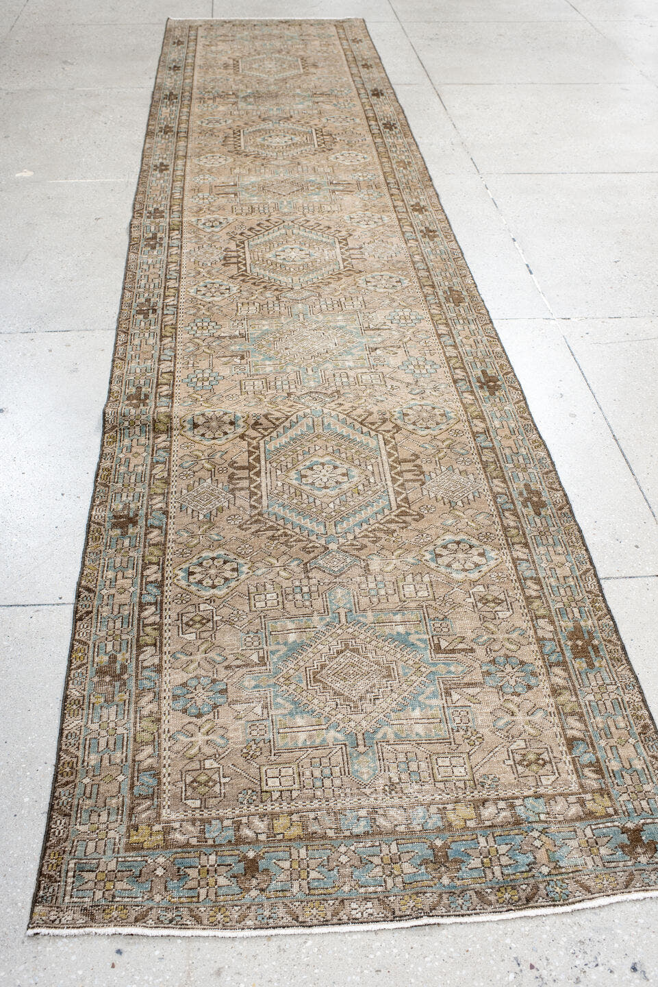 3' x 14' one-of-a-kind handmade antique Karaje runner rug. Color palette: ivory, taupe, light blue, camel, brown, beige