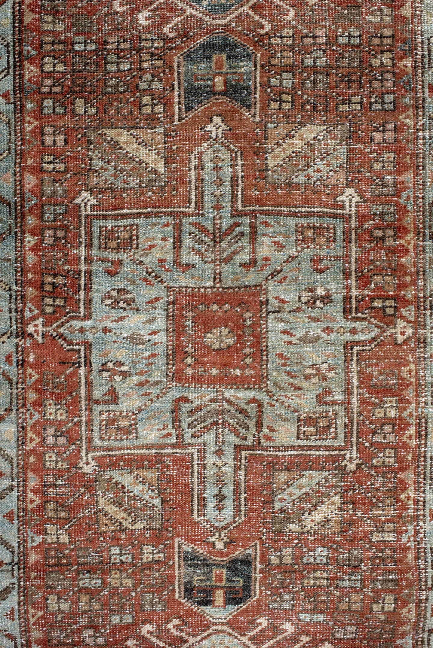 2' x 10' one-of-a-kind handmade antique Karaje runner rug. Color palette: rust, ivory, pale blue, taupe, charcoal, camel