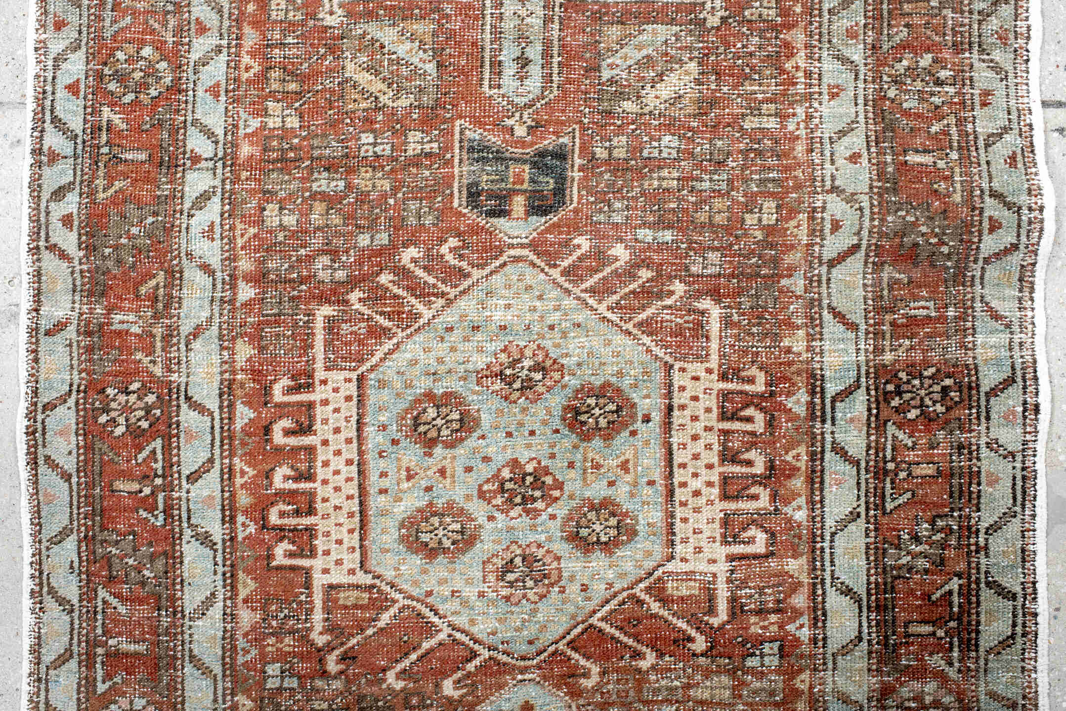 2' x 10' one-of-a-kind handmade antique Karaje runner rug. Color palette: rust, ivory, pale blue, taupe, charcoal, camel