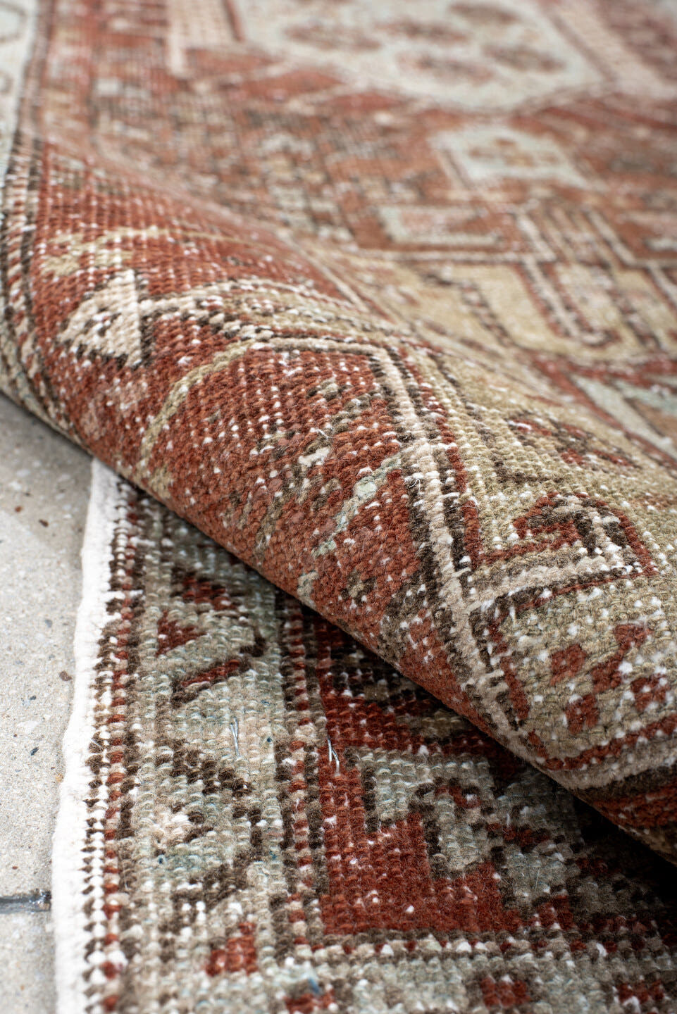 2' x 10' one-of-a-kind handmade antique Karaje runner rug. Color palette: rust, ivory, pale blue, taupe, charcoal, camel