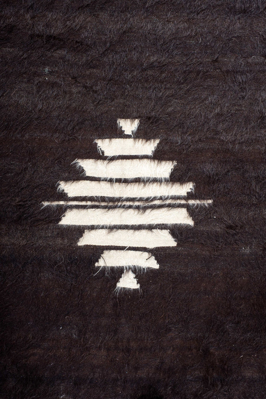 4' x 6' one-of-a-kind handmade antique Tulu small size rug. Color palette: brown, camel, ivory, charcoal, beige, gray, black