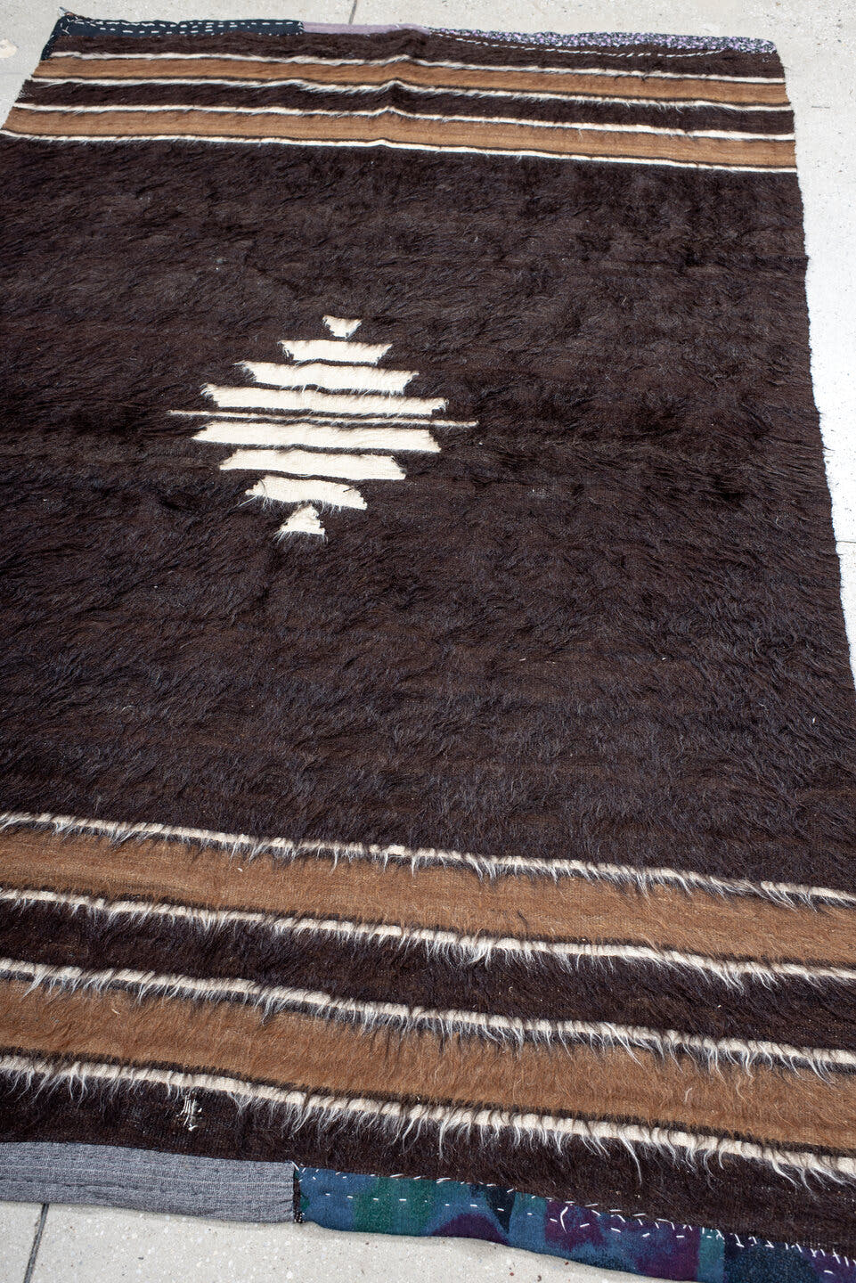 4' x 6' one-of-a-kind handmade antique Tulu small size rug. Color palette: brown, camel, ivory, charcoal, beige, gray, black
