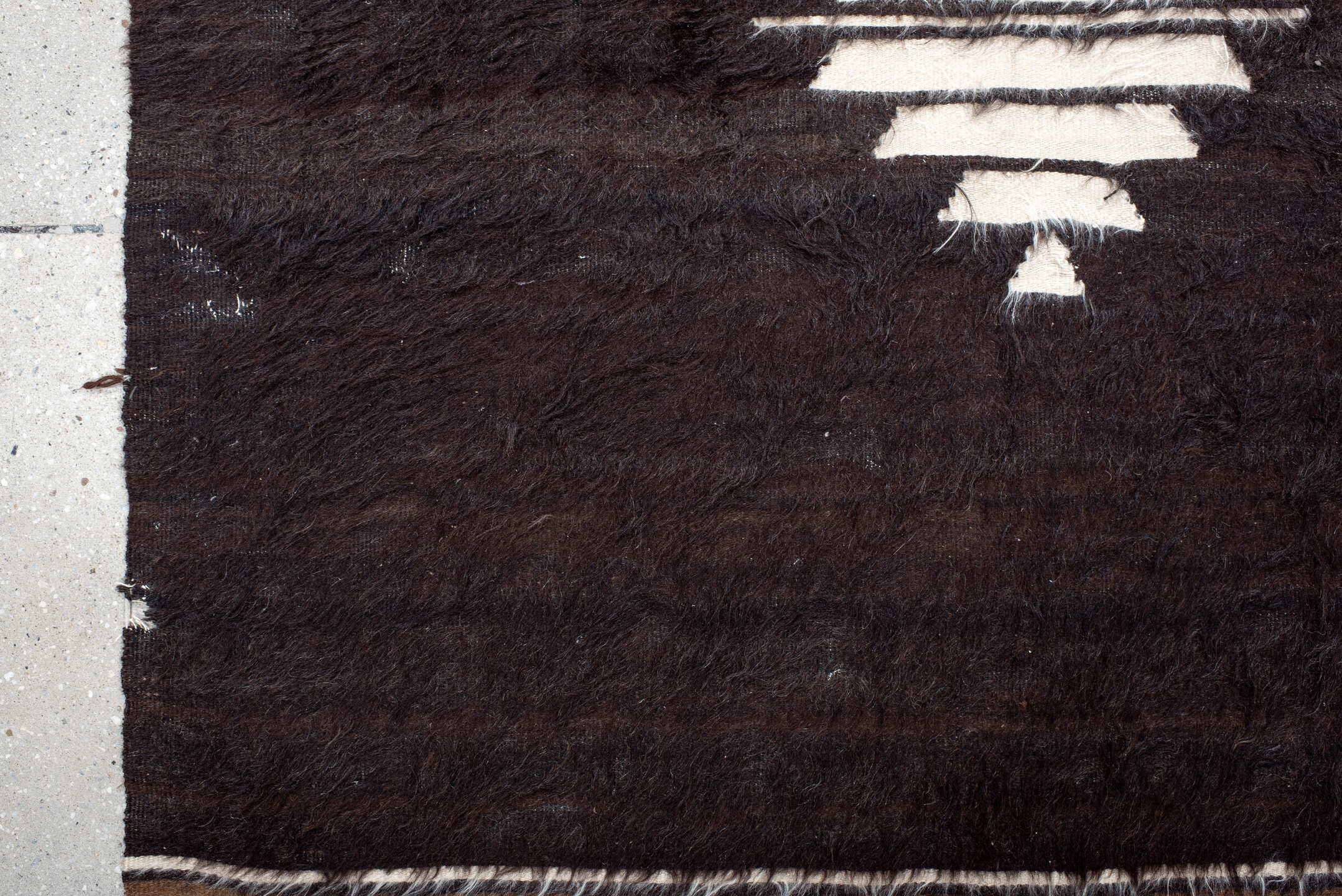 4' x 6' one-of-a-kind handmade antique Tulu small size rug. Color palette: brown, camel, ivory, charcoal, beige, gray, black