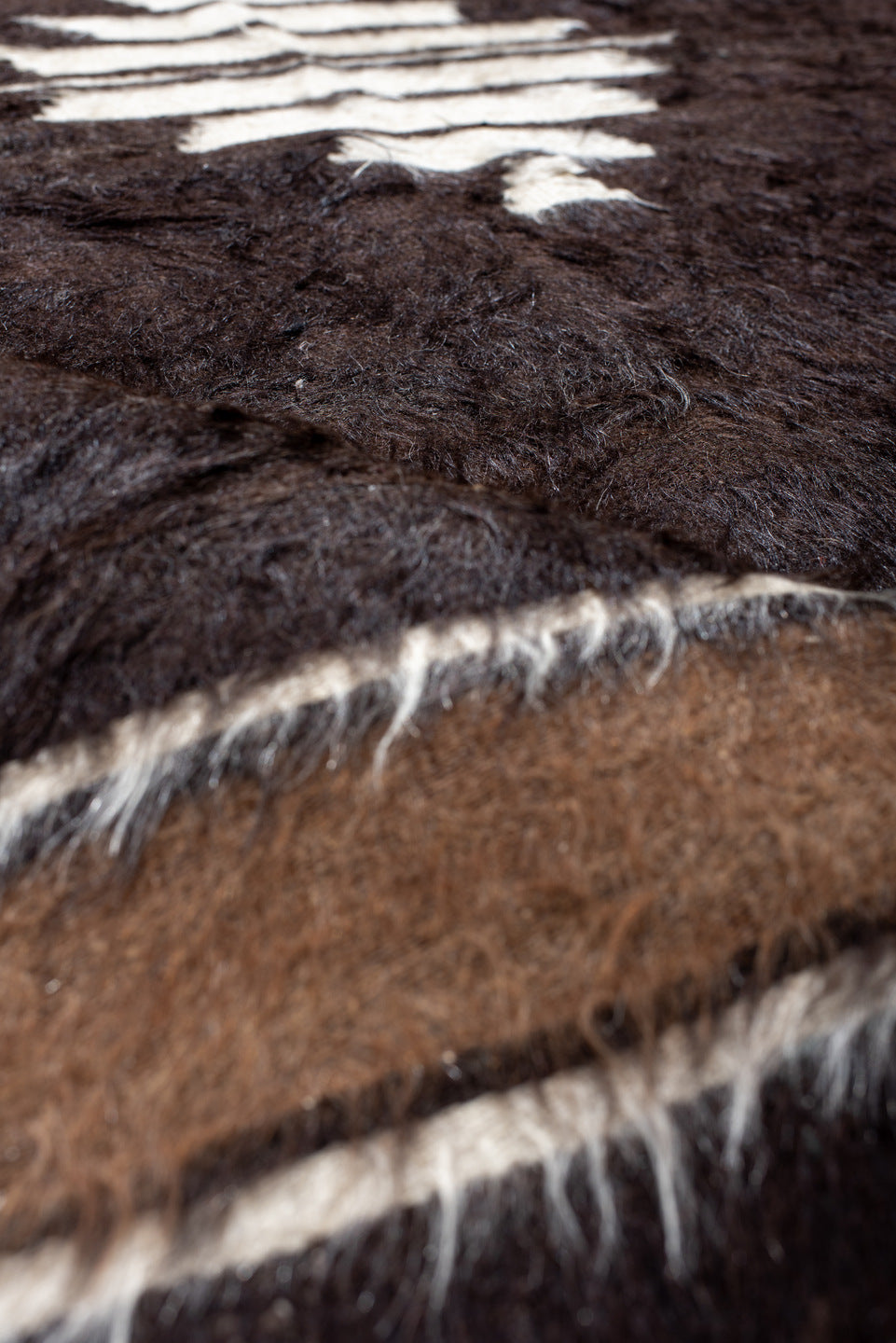 4' x 6' one-of-a-kind handmade antique Tulu small size rug. Color palette: brown, camel, ivory, charcoal, beige, gray, black