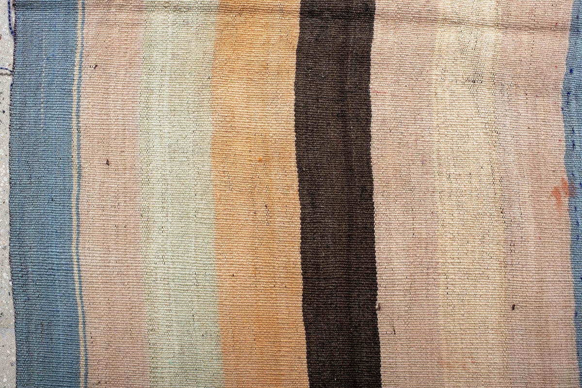 2' x 6' one-of-a-kind handmade vintage runner rug. Color palette: ivory, pale blue, peach, brown, cream, charcoal, lavender