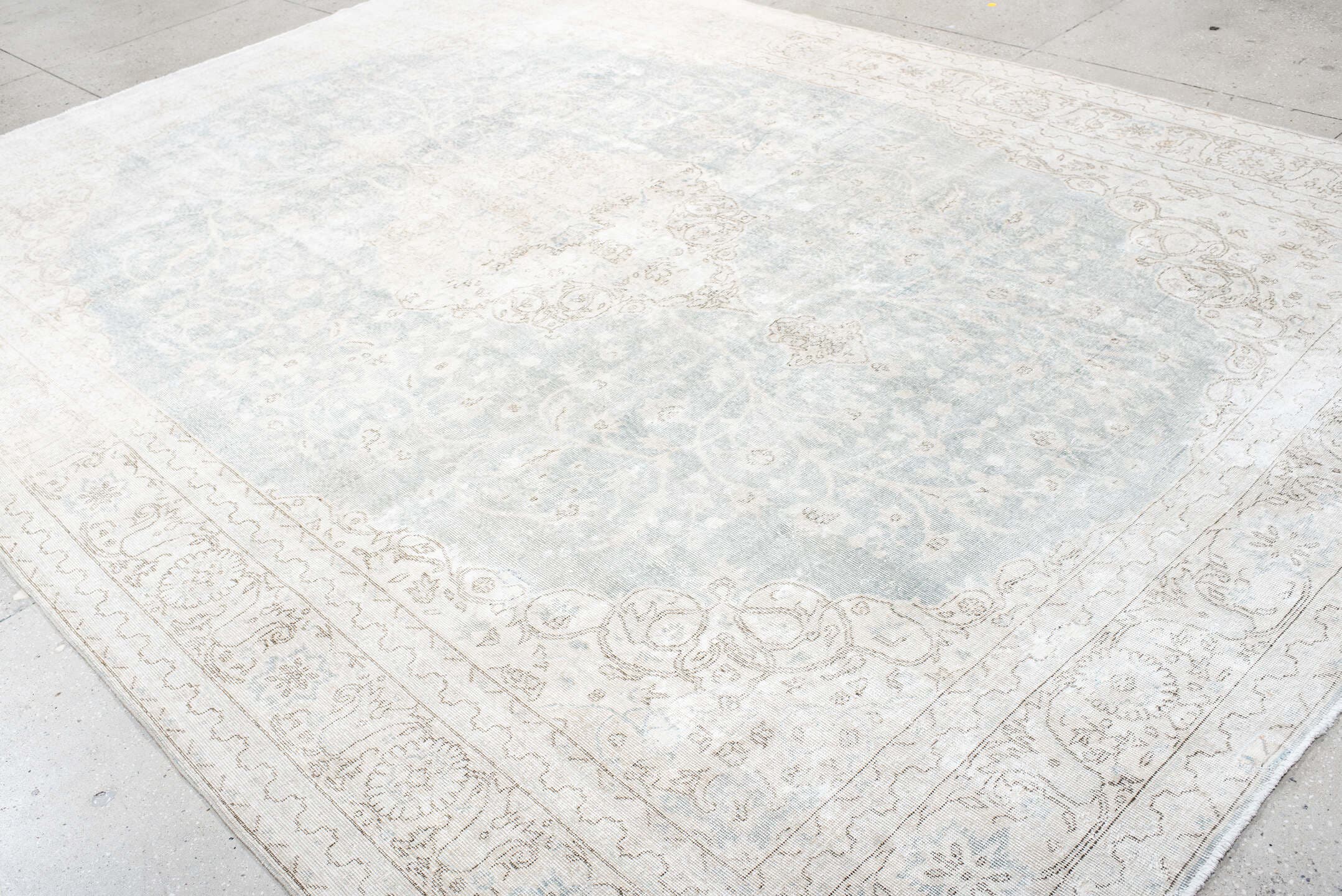 9' x 13' one-of-a-kind handmade antique Sparta large size rug. Color palette: ivory, pale blue, beige, cream, taupe