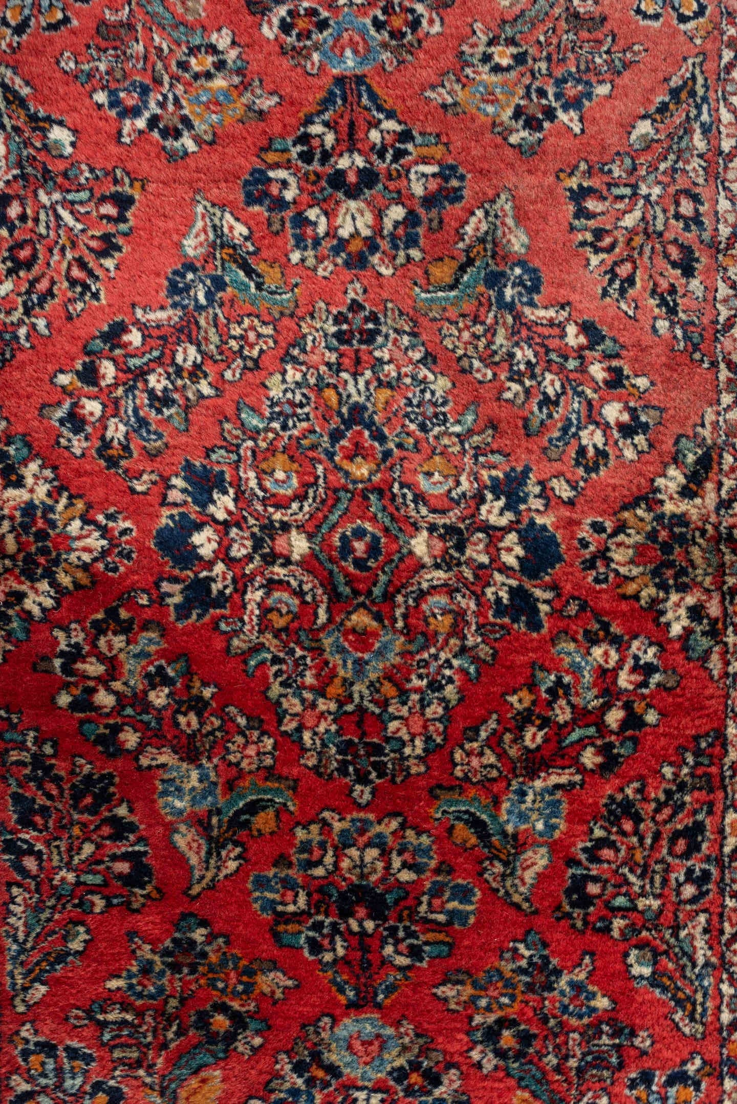 2' x 4' one-of-a-kind handmade antique Sarouk small size rug. Color palette: rust, navy, ivory, sky blue, camel, saffron