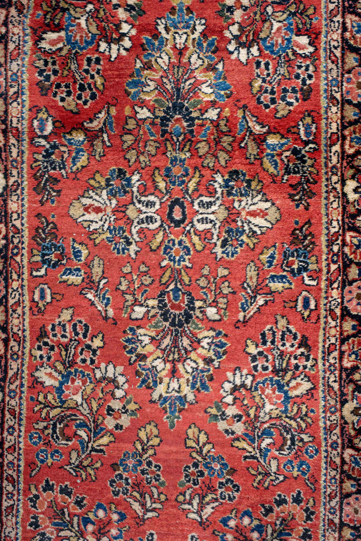 2' x 18' one-of-a-kind handmade antique Sarouk runner rug. Color palette: rust, ivory, navy, soft blue, rose, charcoal