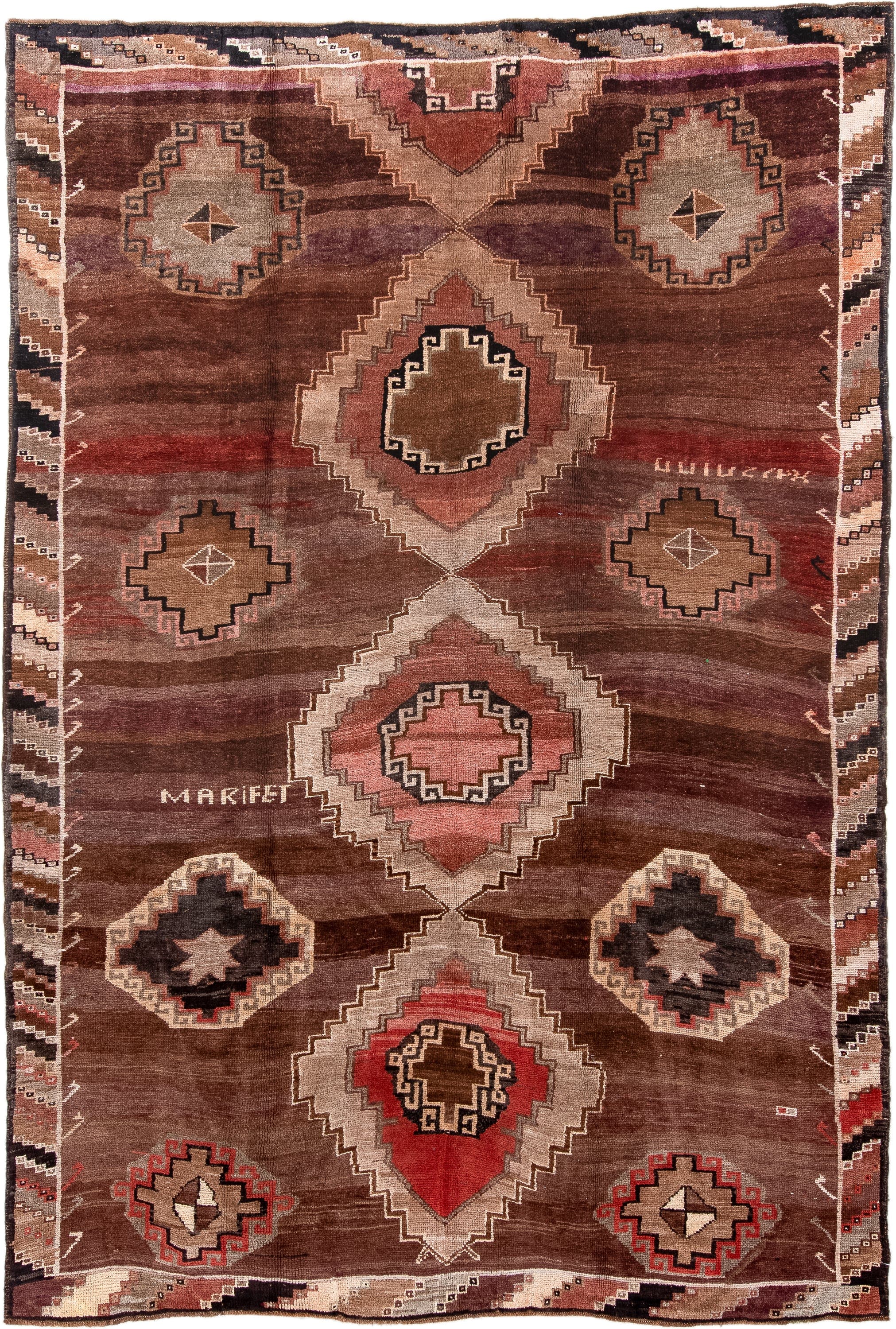 7' x 11' one-of-a-kind handmade antique Kars large size rug. Color palette: brown, taupe, rose, rust, ivory, charcoal