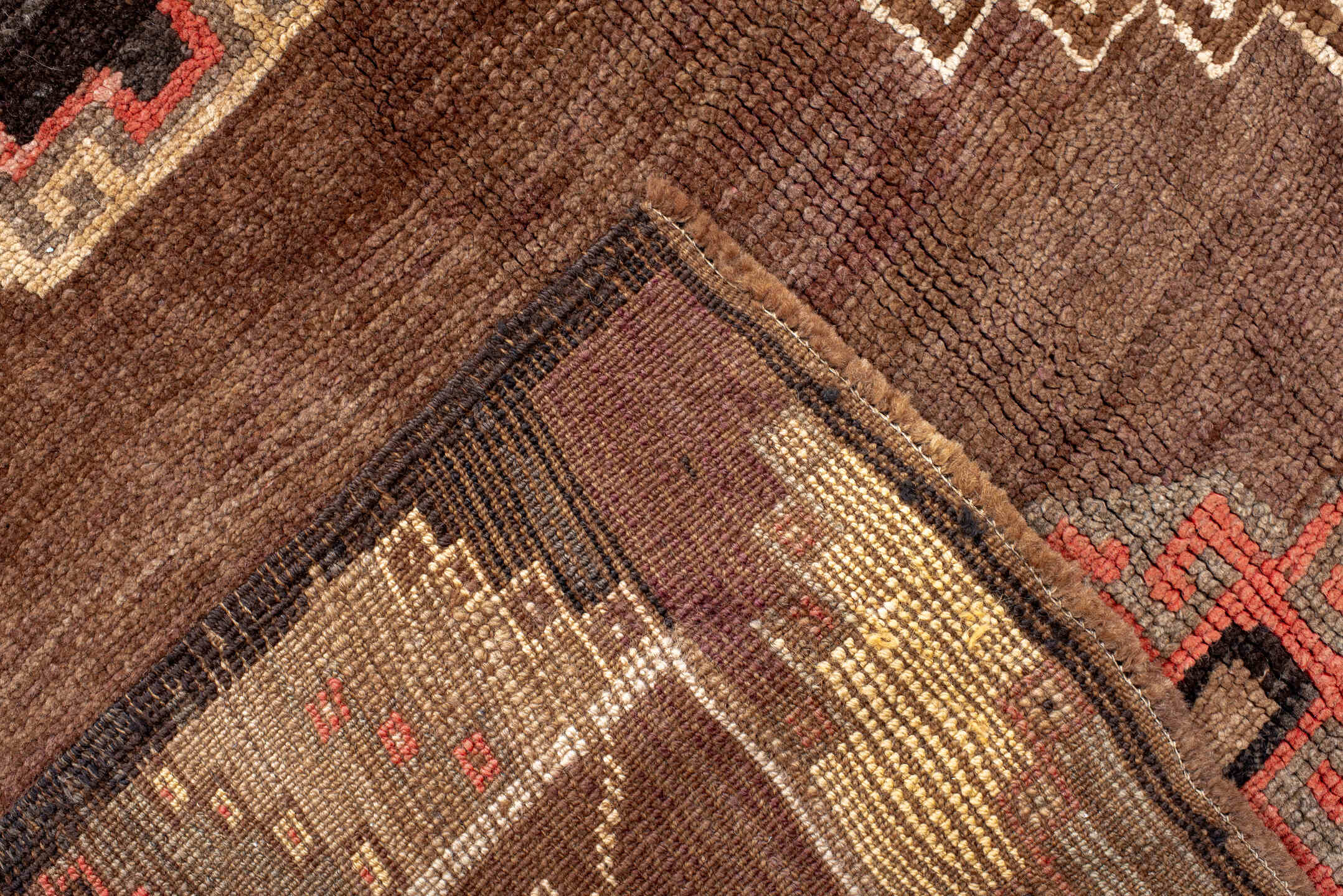 7' x 11' one-of-a-kind handmade antique Kars large size rug. Color palette: brown, taupe, rose, rust, ivory, charcoal