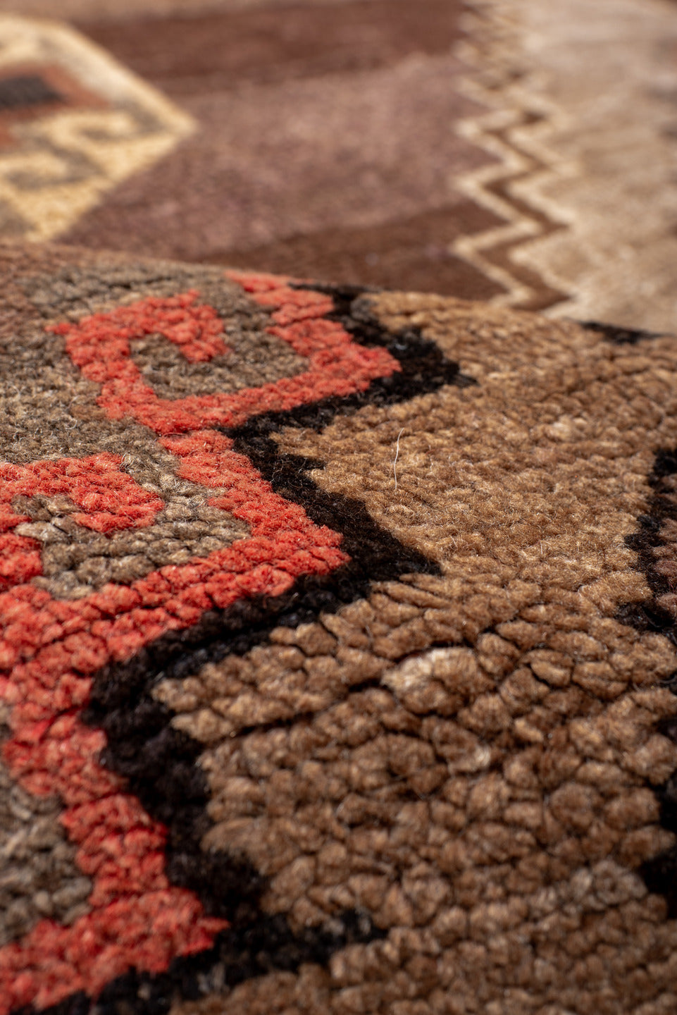 7' x 11' one-of-a-kind handmade vintage Kars large size rug. Color palette: brown, gray, maroon, off-white, orange, pink