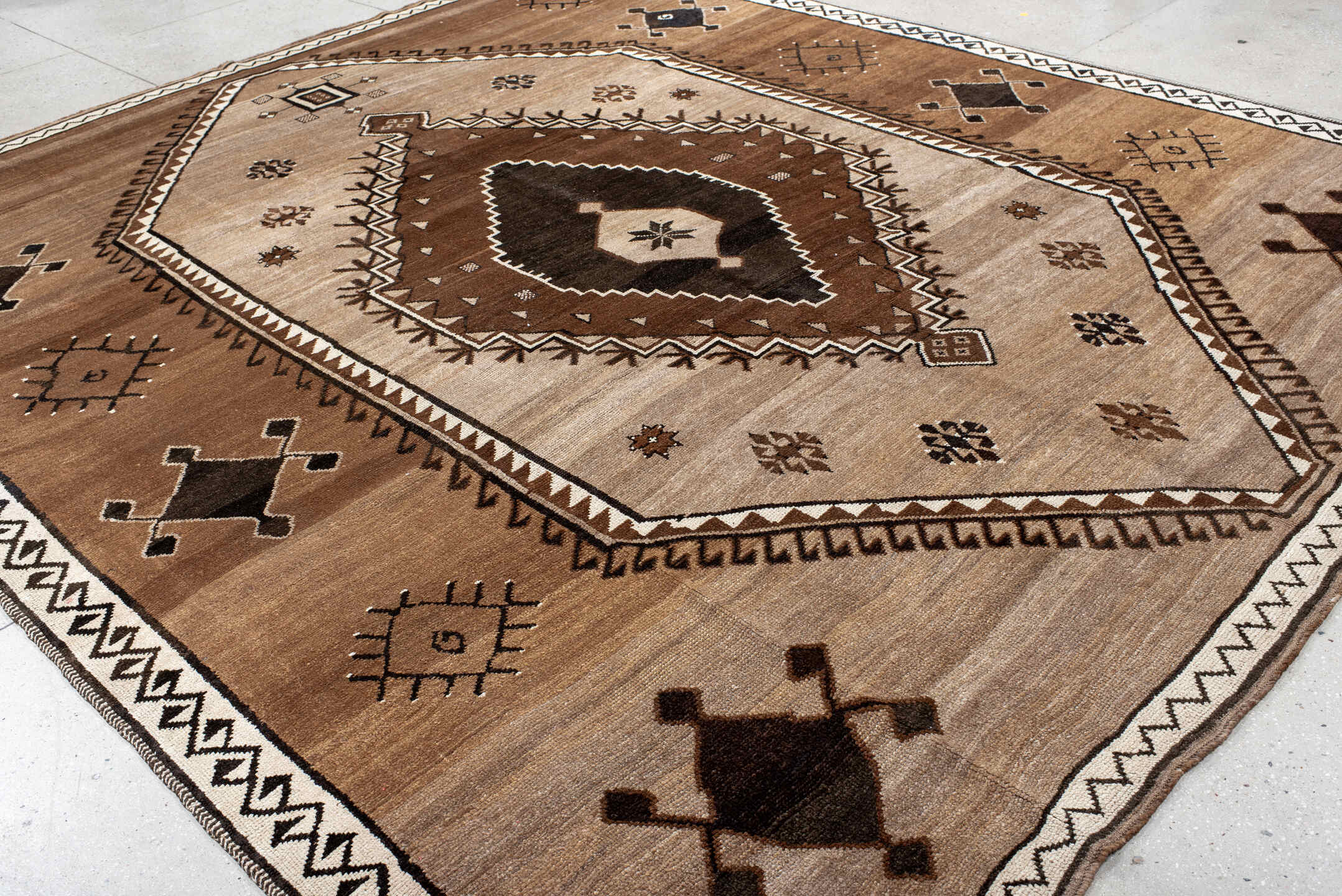 10' x 12' one-of-a-kind handmade antique Kars large size rug. Color palette: camel, ivory, brown, charcoal, taupe, beige